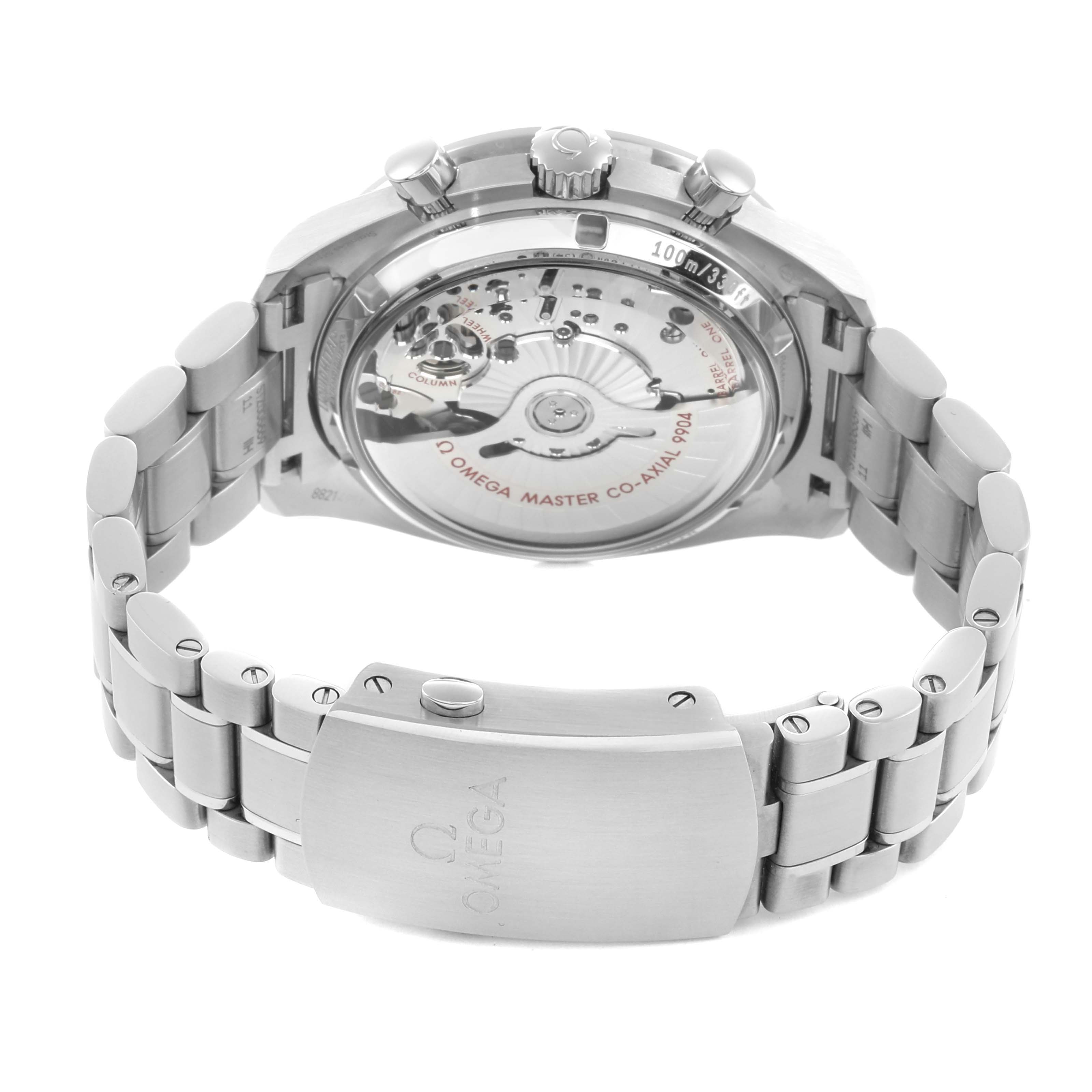 The Omega Speedmaster 304.33.44.52.03.001 Men
s Stainless Steel Blue Dial watch is shown from the back, highlighting the transparent case back and stainless steel bracelet.