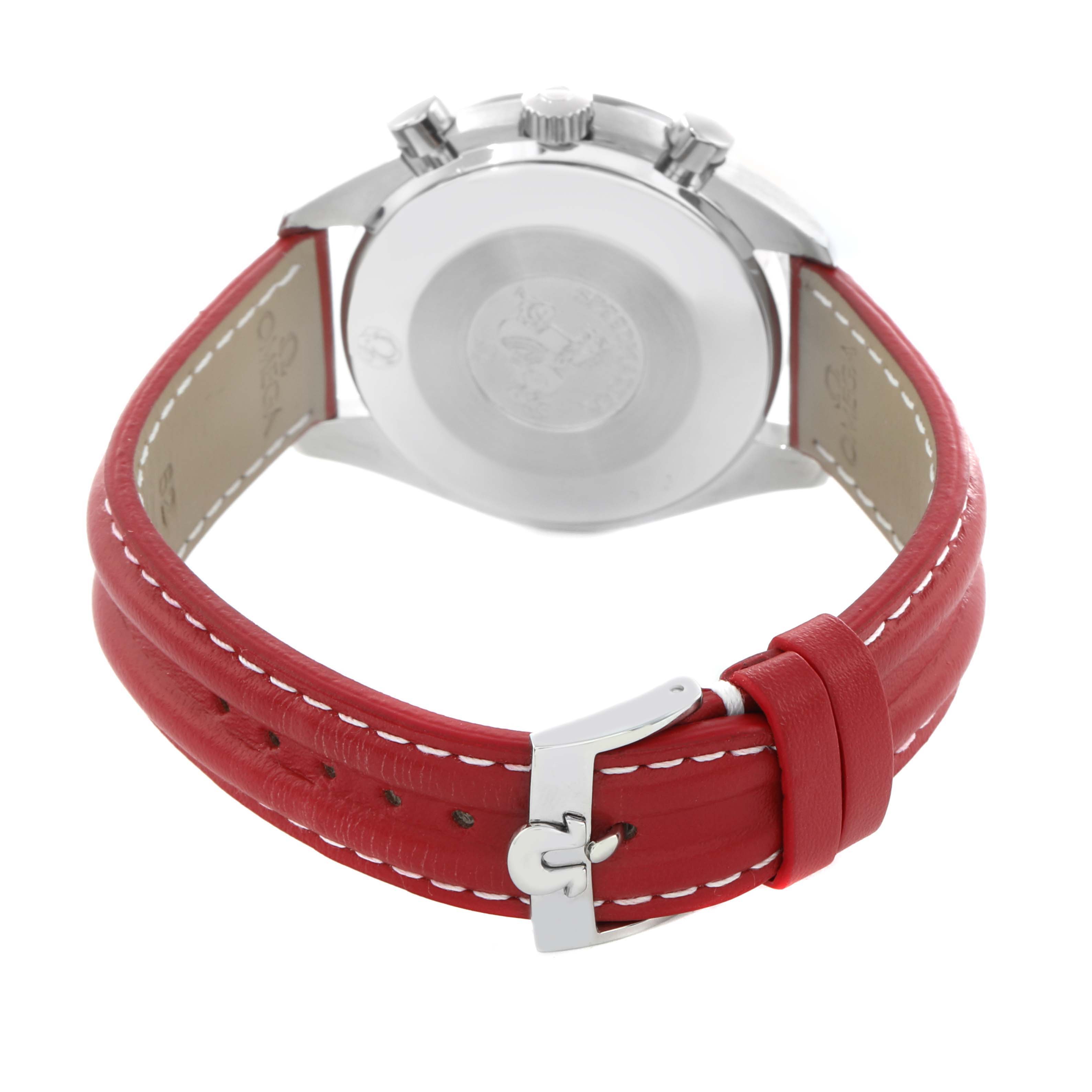 The image shows the back view of an Omega Speedmaster 3539.50.00 Men
s Stainless Steel Black Dial watch with a red strap and buckle.