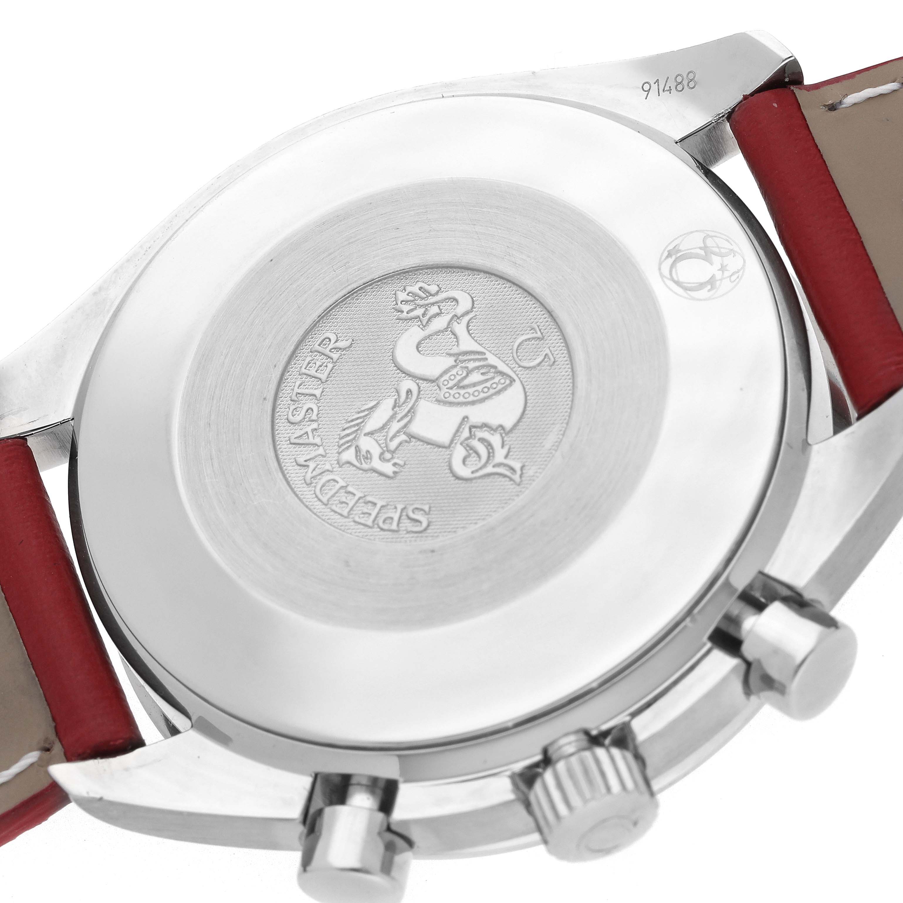 The image shows the engraved case back and crown side of an Omega Speedmaster 3539.50.00 Men
s Stainless Steel Black Dial watch.