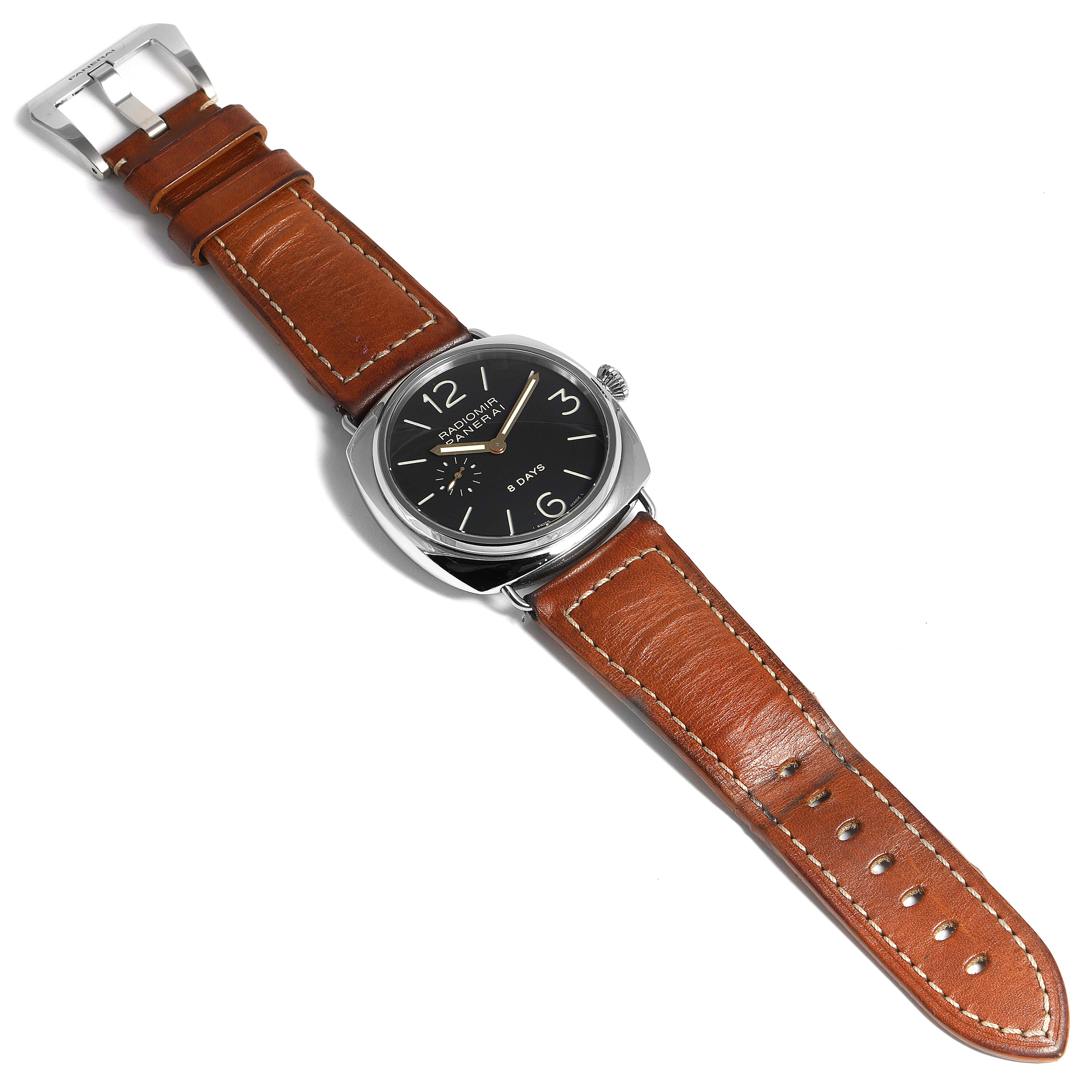 The image shows a Panerai Radiomir PAM00190 Men's Stainless Steel Black Dial PAM00190 Men's Stainless Steel Black Dial watch from an overhead angle, displaying its brown leather strap and black dial.