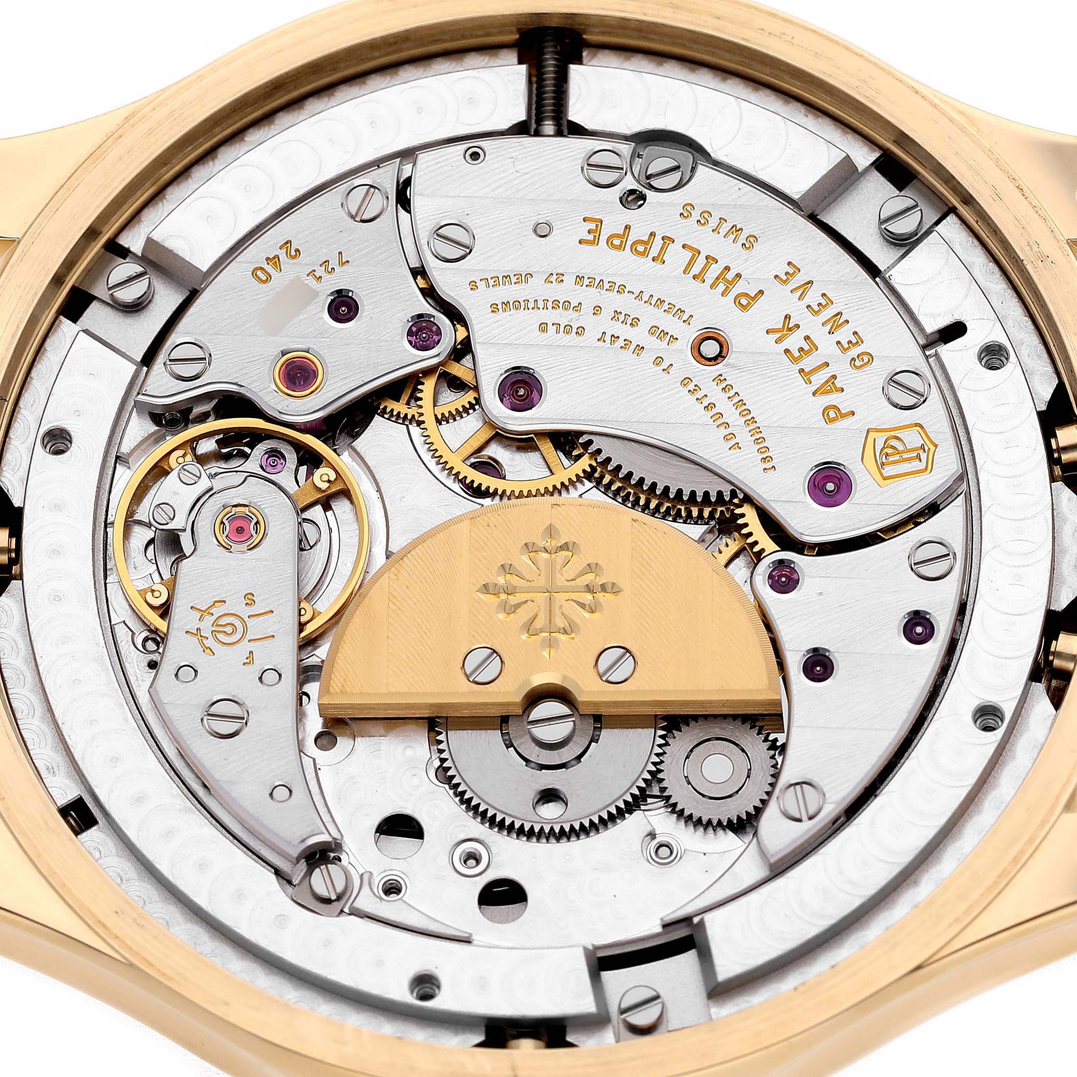 The image shows the intricate movement mechanism of a Patek Philippe Complications 5327J-001 Men's Yellow Gold Beige Dial watch from the back angle.