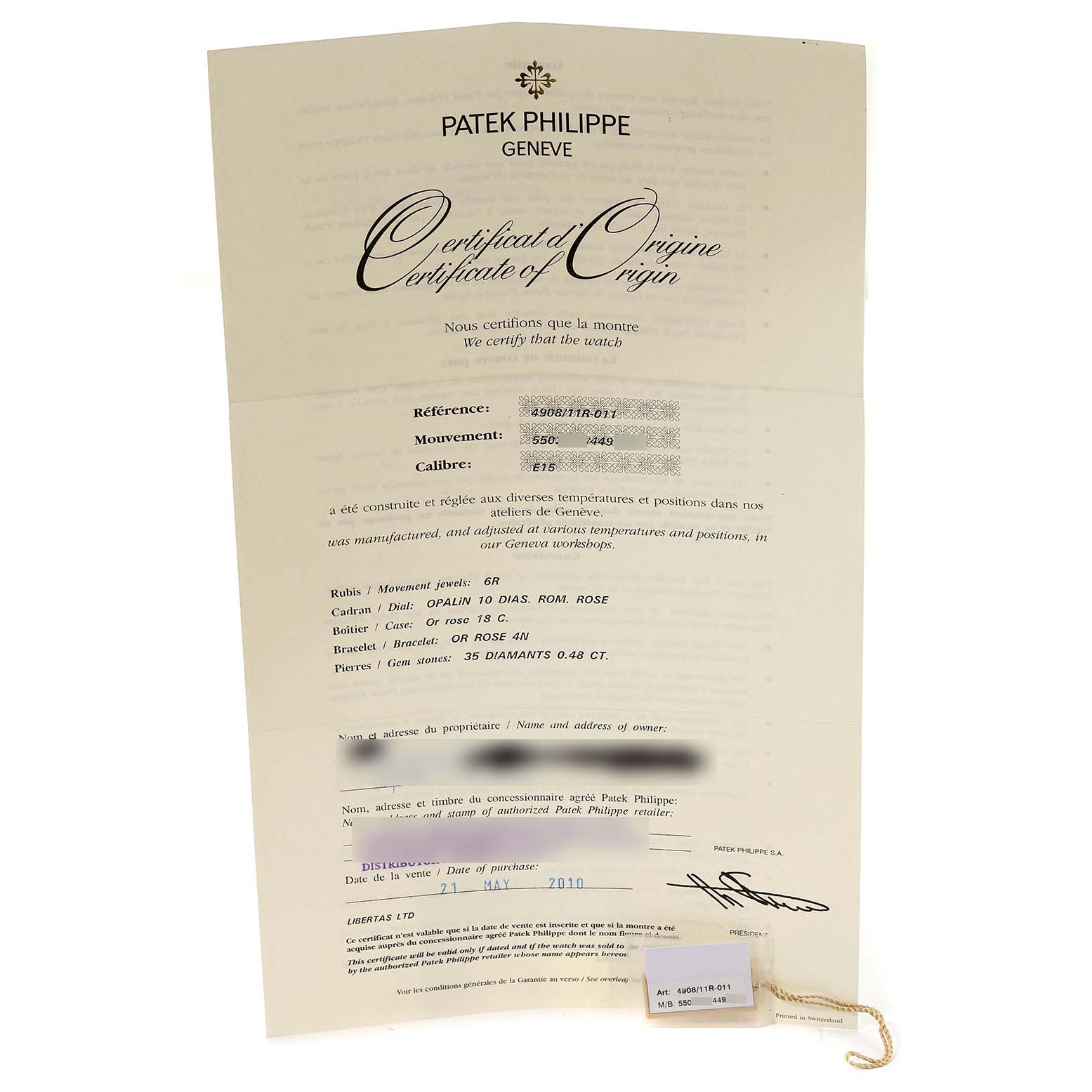 This image shows a Certificate of Origin for a Patek Philippe Twenty-4 4908/11R-011 Women's Rose Gold Silver Dial 4908/11R-011 Women's Rose Gold Silver Dial model watch from a front angle.