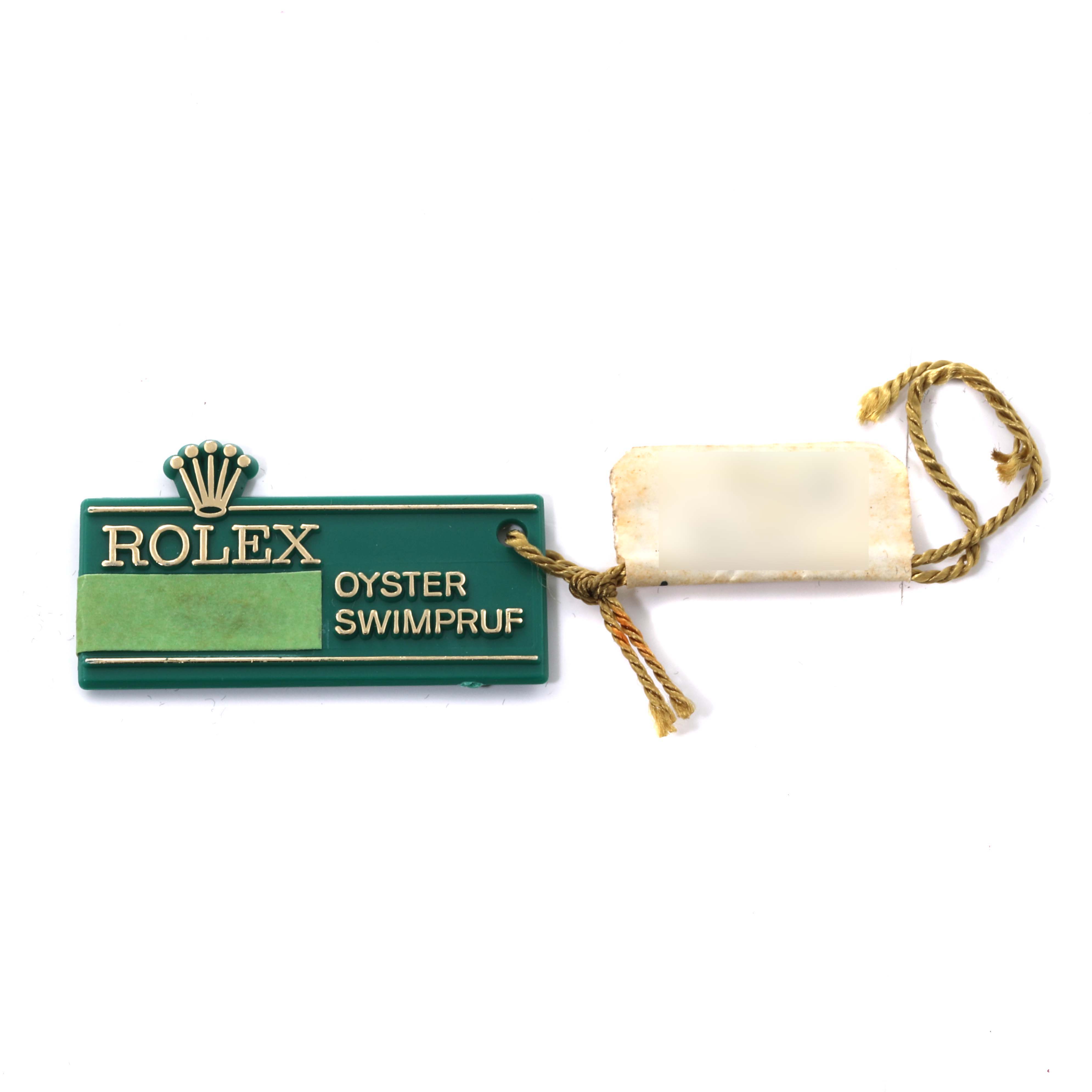 This image shows a green Rolex Oyster Swimpruf tag, likely associated with a Vintage Collection model by Rolex.
