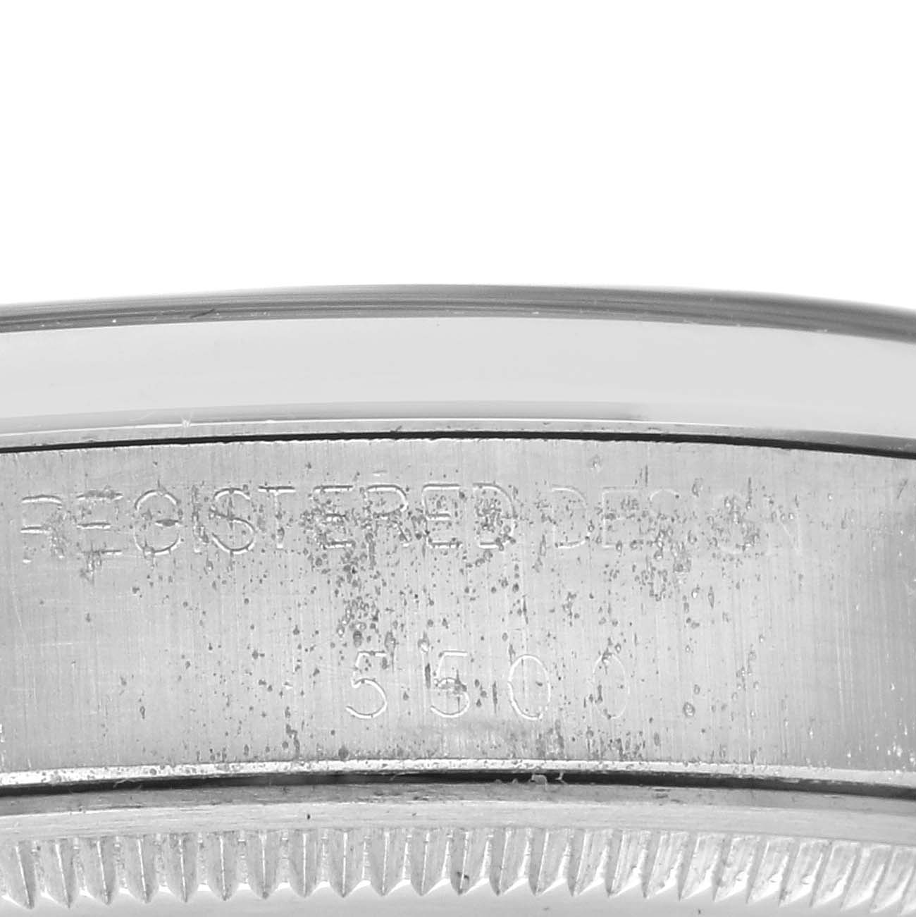 This image shows the side engraving and bezel teeth of a Rolex Vintage Collection 5500 Men's Stainless Steel Silver Dial 5500 Men's Stainless Steel Silver Dial watch.