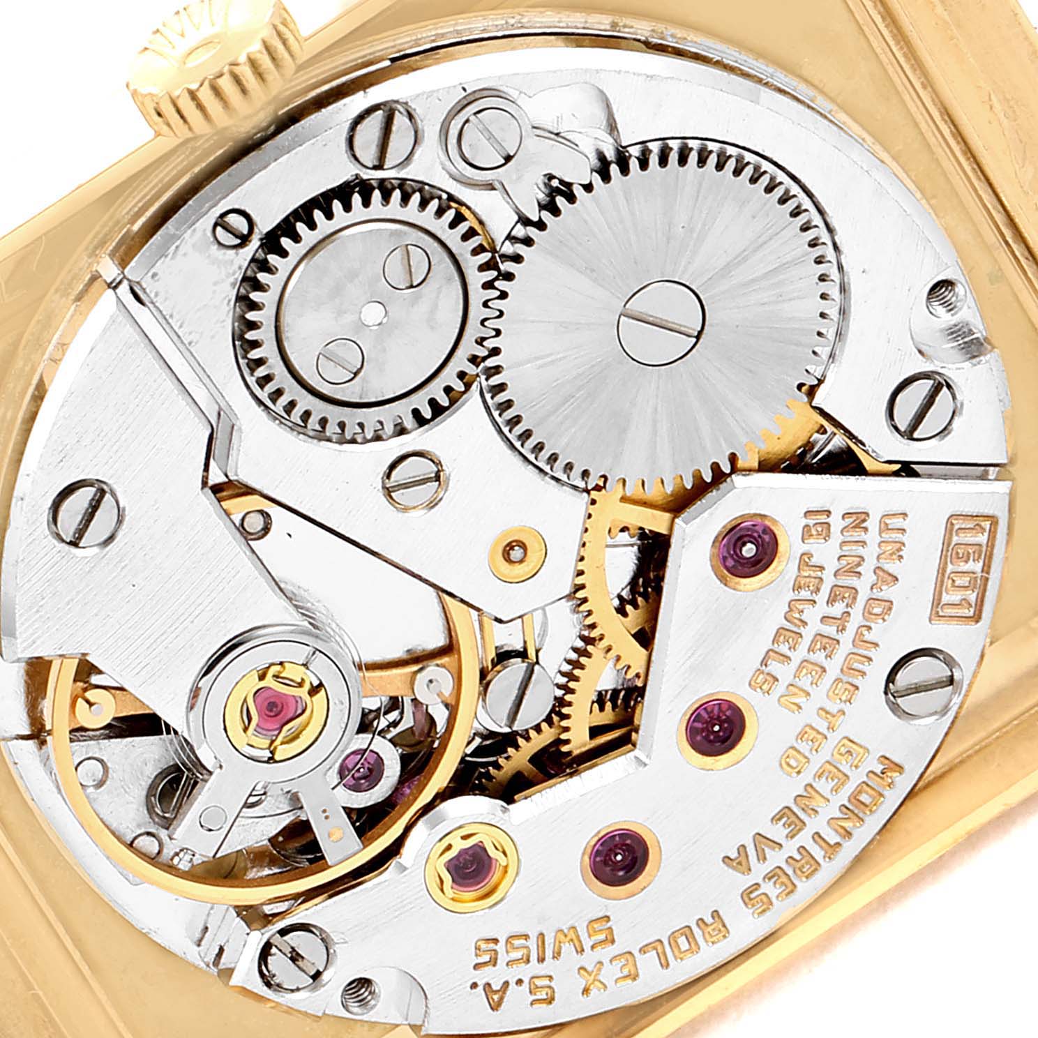 This image shows the intricate internal mechanism of a Rolex Cellini 4103 Women's Yellow Gold Champagne Dial 4103 Women's Yellow Gold Champagne Dial watch, highlighting gears and jewels from a top-down angle.