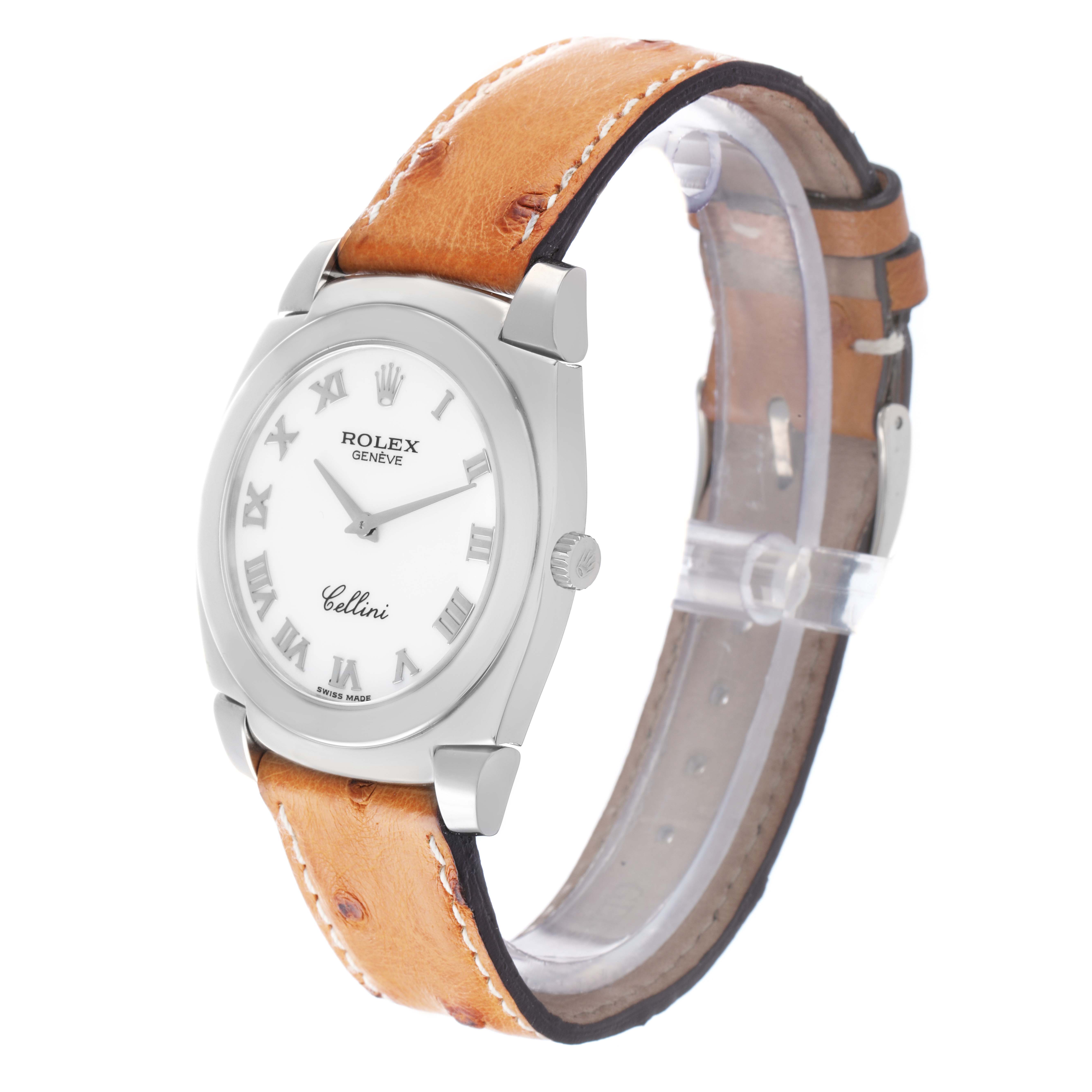 The Rolex Cellini 5330 Men
s White Gold White Dial watch is shown at a slight angle, highlighting its face, case, crown, and leather strap.