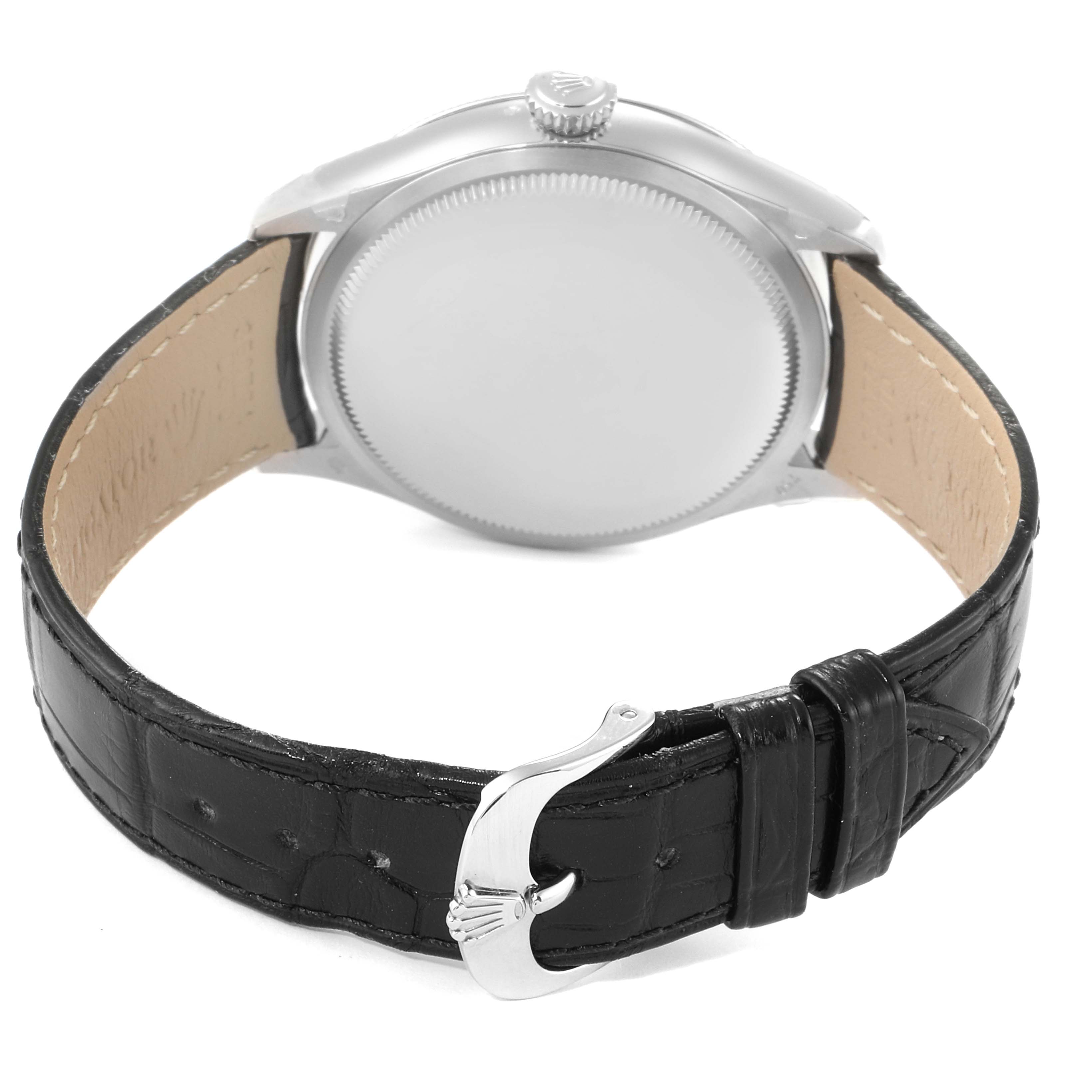 The image shows the back of a Rolex Cellini 50509 Men
s White Gold White Dial 50509 Men
s White Gold White Dial watch, highlighting its case and black leather strap with a buckle.