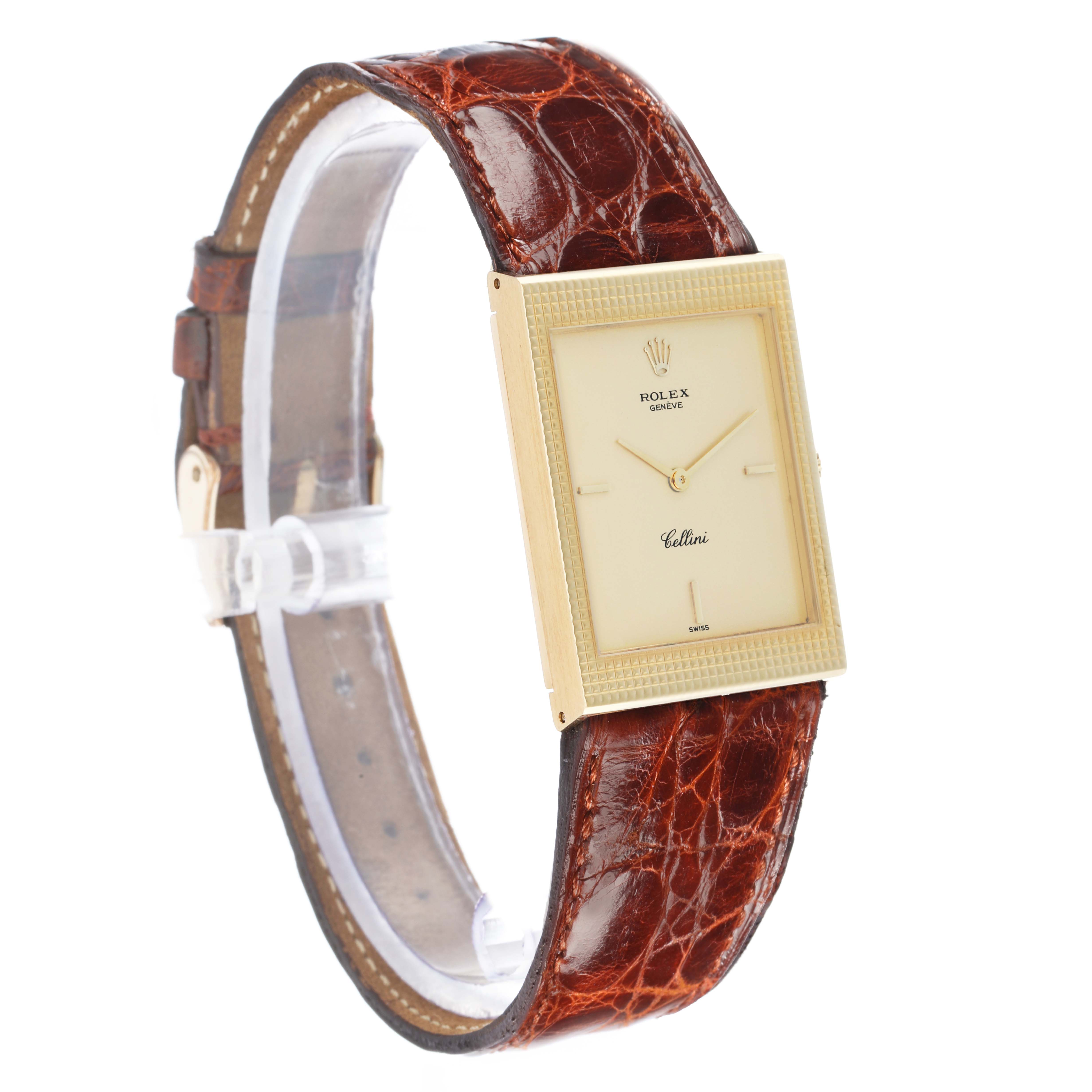 The Rolex Cellini 4127 Men
s Yellow Gold Champagne Dial watch is shown at a three-quarter angle, highlighting its face, strap, and gold rectangular bezel.