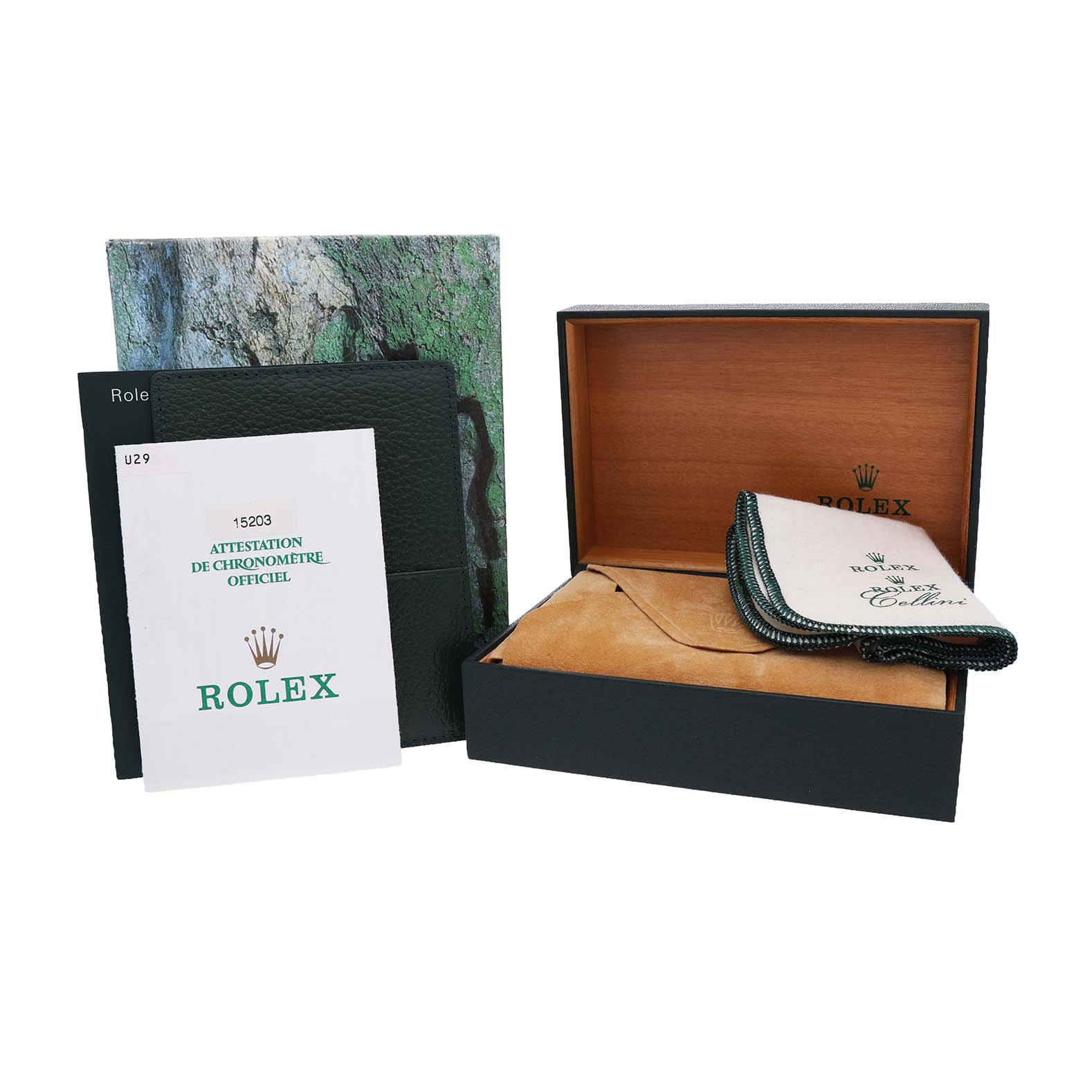 The image shows the Rolex Date 15203 Men's Steel and Gold (two tone) White Dial model's open box, documentation, and a cleaning cloth.