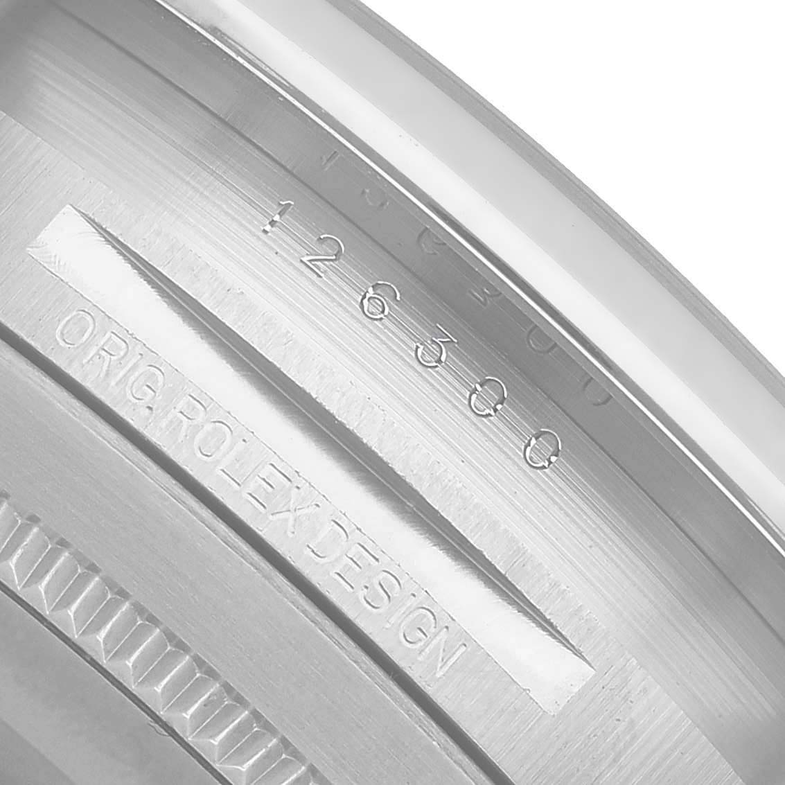 The image shows the inner bezel with engraving details of the Rolex Datejust 41 126300 Men's Stainless Steel Blue Dial model.