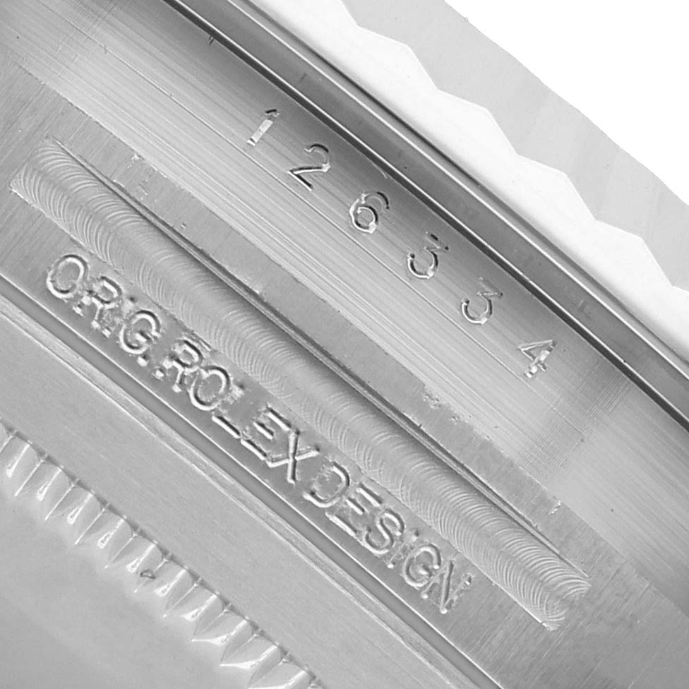 The image shows a close-up of the inner case engraving on a Rolex Datejust 41 126334 Men's Stainless Steel Grey Dial, featuring the model number and "ORIG ROLEX DESIGN."