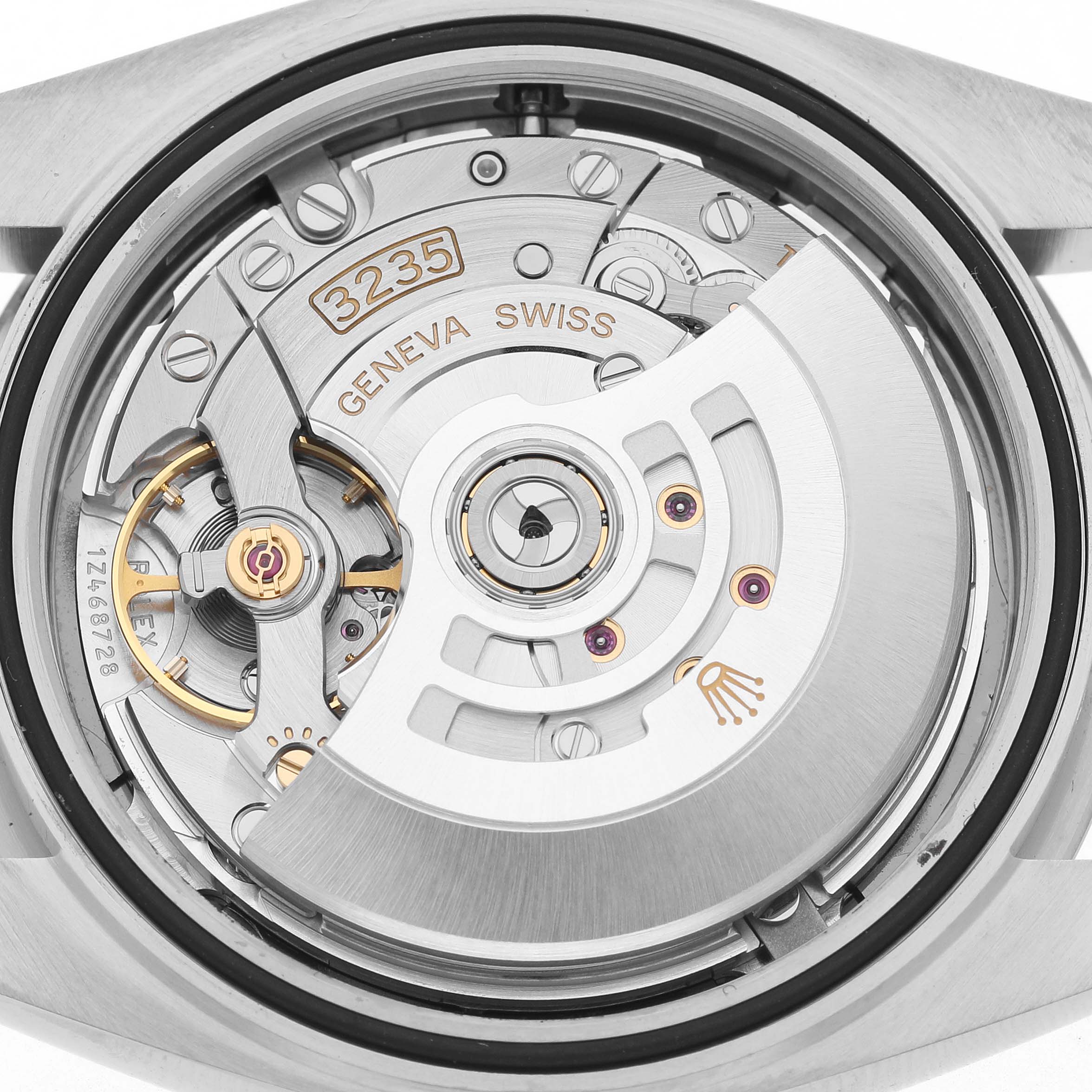 The image shows the back view of a Rolex Datejust 41 126334 Men's Stainless Steel Grey Dial, highlighting its movement mechanism.