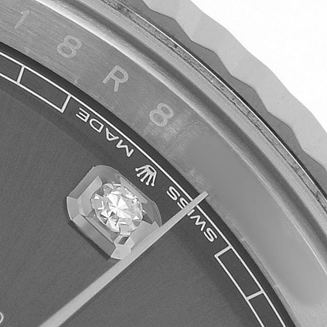 The image shows a close-up of the dial, diamond marker, and bezel of a Rolex Datejust 41 126334 Men's Stainless Steel Grey Dial watch.