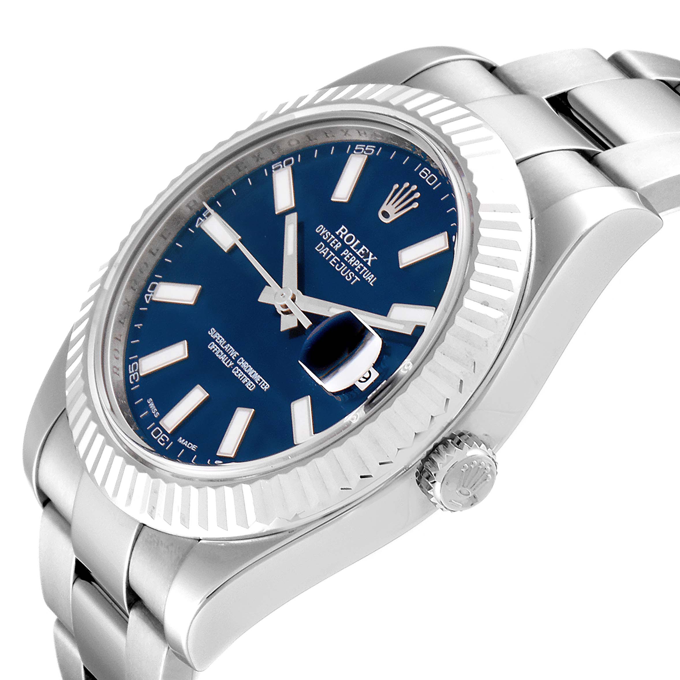 The image shows a close-up side angle of a Rolex Datejust 41 116334 Men
s Stainless Steel Blue Dial 116334 Men
s Stainless Steel Blue Dial watch, highlighting its blue dial, fluted bezel, and stainless steel bracelet.