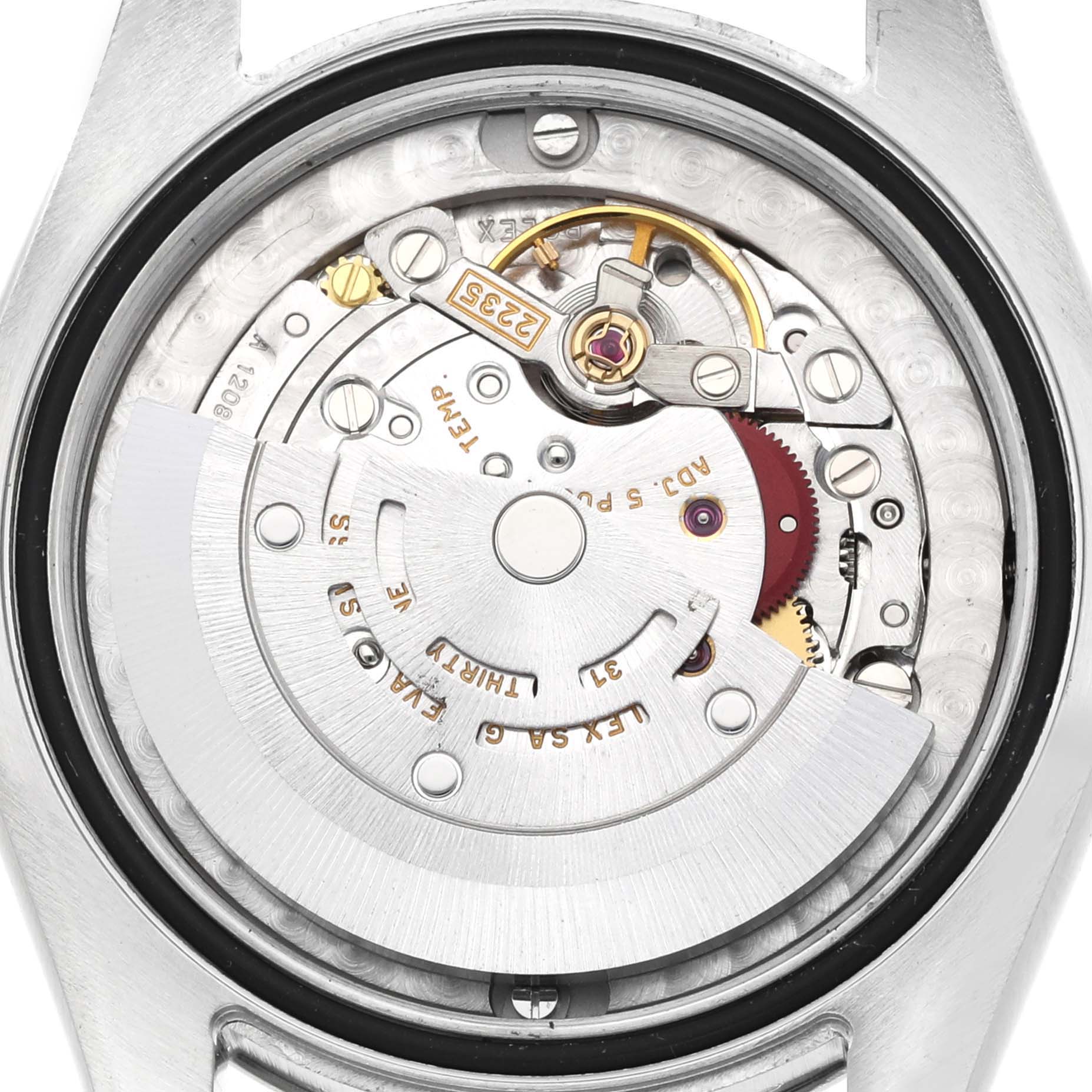 The image shows a detailed close-up of the movement mechanism of a Rolex Mid-Size 178274 Women's Stainless Steel Black Dial 178274 Women's Stainless Steel Black Dial model watch.