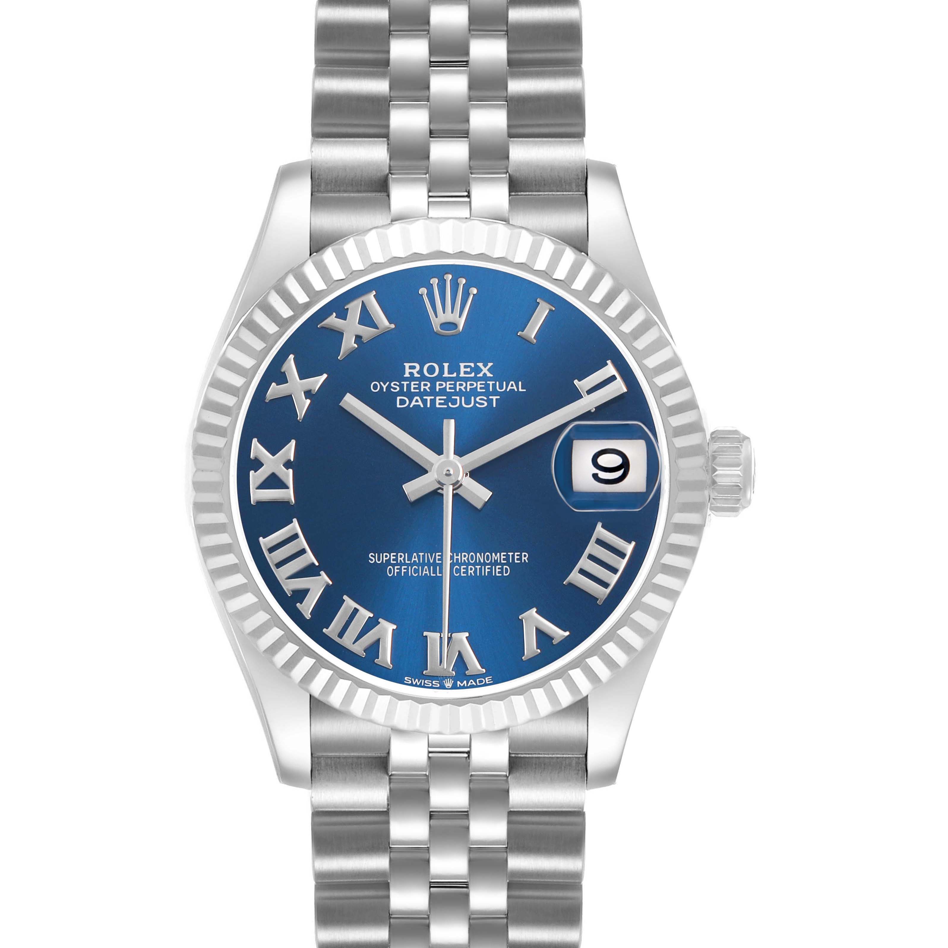 The Rolex Mid-Size 278274 Women's Stainless Steel Blue Dial watch is shown from the front, highlighting its blue dial, fluted bezel, Roman numerals, and date display.