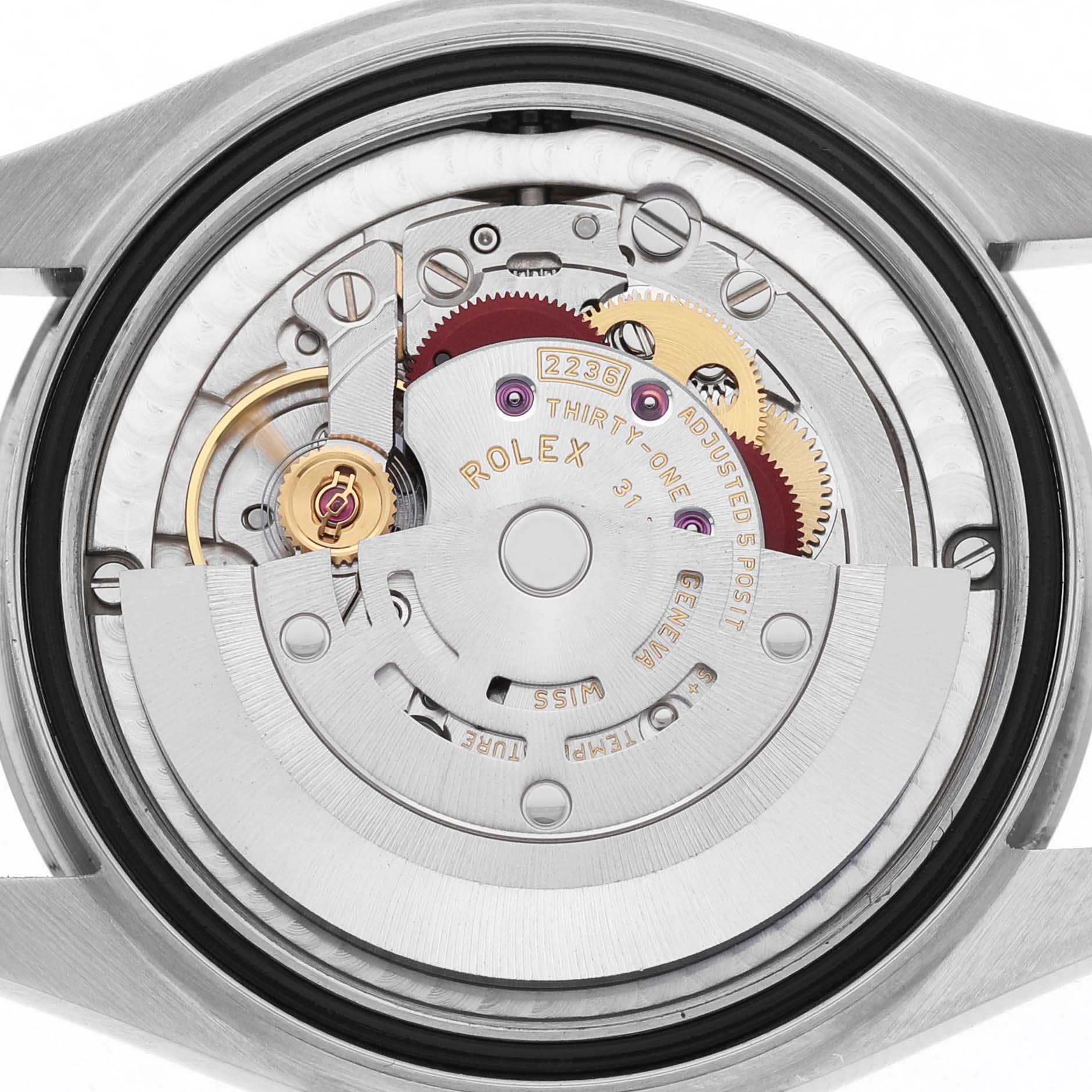 The image shows a back view of the Rolex Mid-Size 278274 Women's Stainless Steel Blue Dial model, highlighting the movement and inner mechanics.