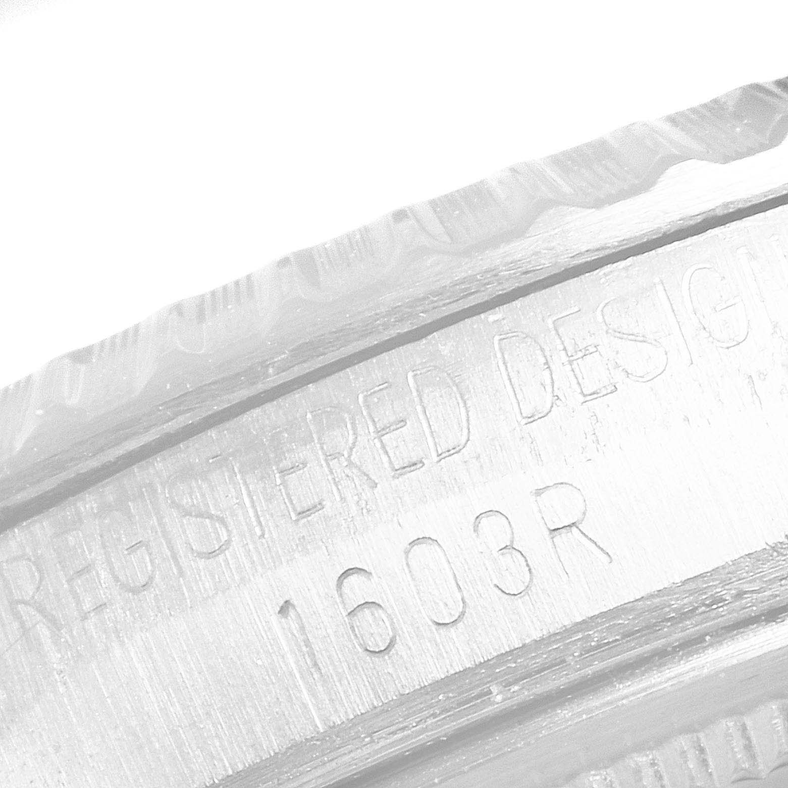 The image shows a close-up angle of the casing side of the Vintage Collection model by Rolex, focusing on the engraved serial number.