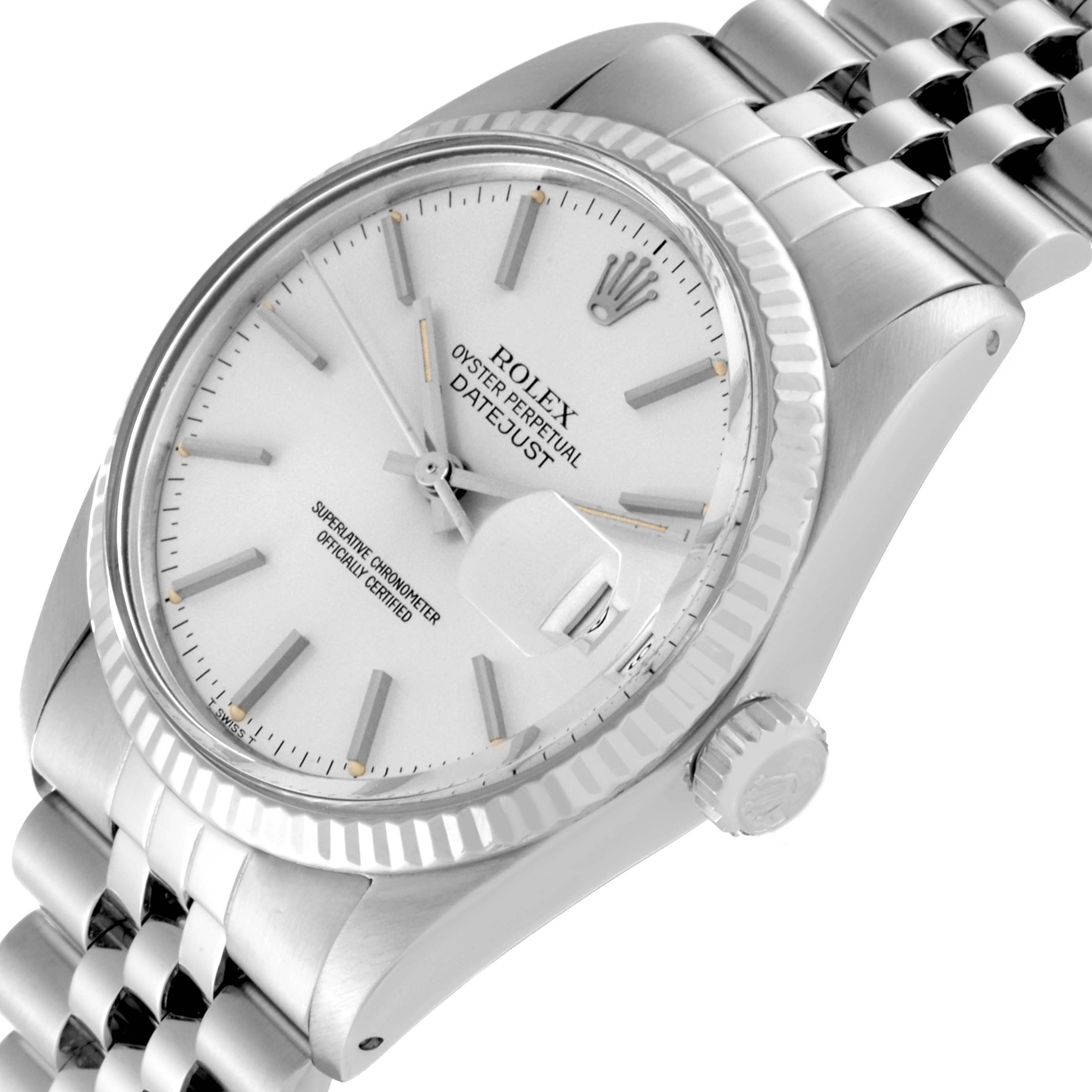 This image shows a side-angle view of a Rolex Vintage Collection 16014 Men's Stainless Steel Silver Dial 16014 Men's Stainless Steel Silver Dial Oyster Perpetual Datejust watch, highlighting its dial, bezel, and crown.