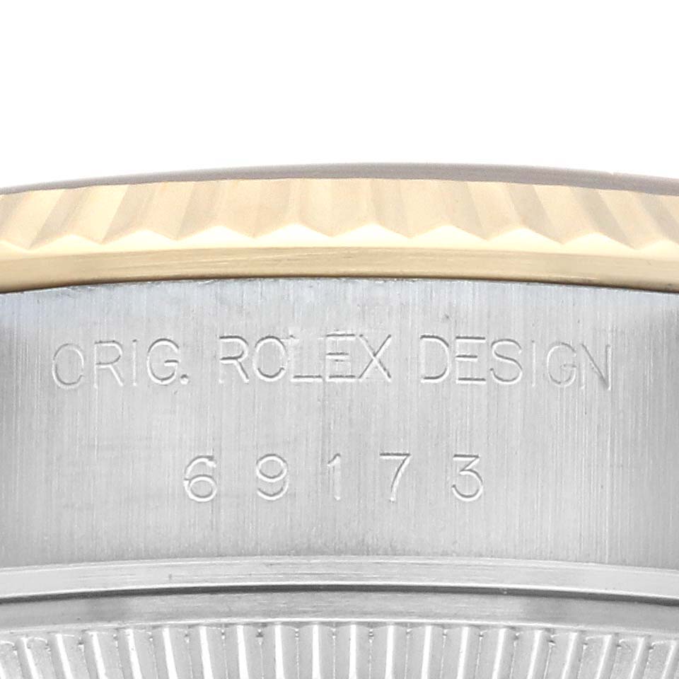 The image shows a close-up of the bezel and case side of a Rolex Datejust 69173 Women's Steel and Gold (two tone) Champagne Dial 69173 Women's Steel and Gold (two tone) Champagne Dial watch, featuring the model number 69173.