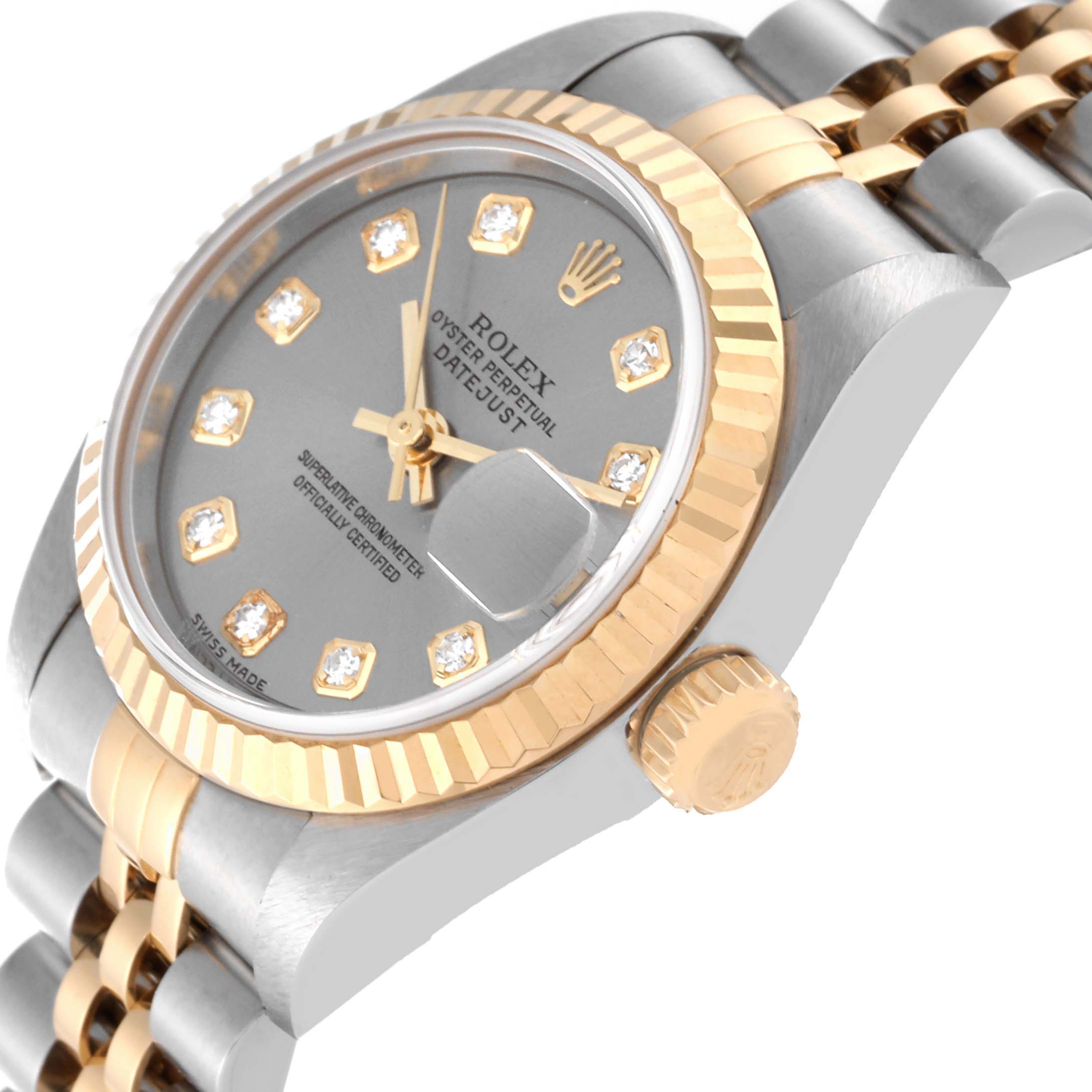 This image shows a close-up angled view of the face, bezel, crown, and part of the bracelet of a Rolex Datejust 79173 Women's Steel and Gold (two tone) Silver Dial 79173 Women's Steel and Gold (two tone) Silver Dial model.