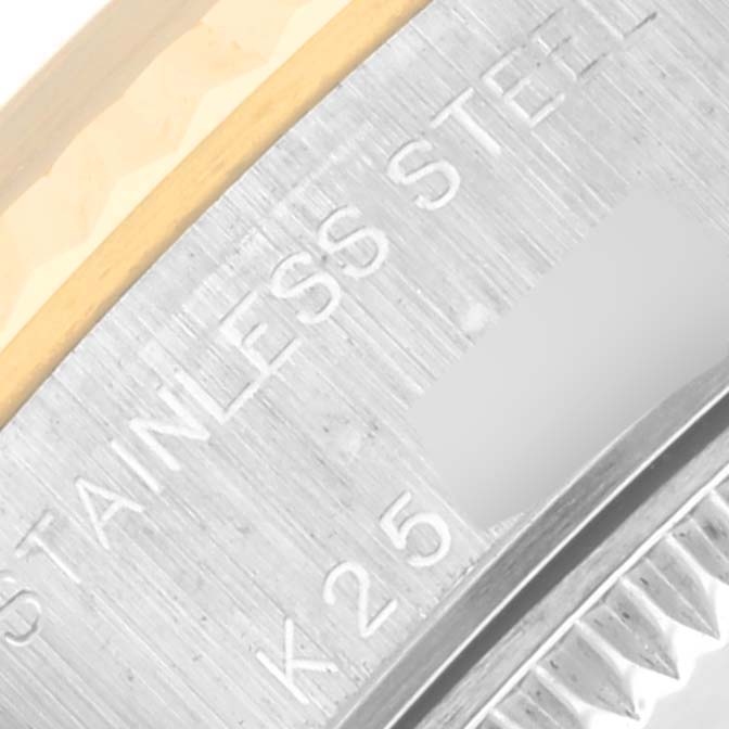 Close-up of the case back of a Rolex Datejust 79173 Women's Steel and Gold (two tone) Silver Dial 79173 Women's Steel and Gold (two tone) Silver Dial watch, showing the words "STAINLESS STEEL" engraved.