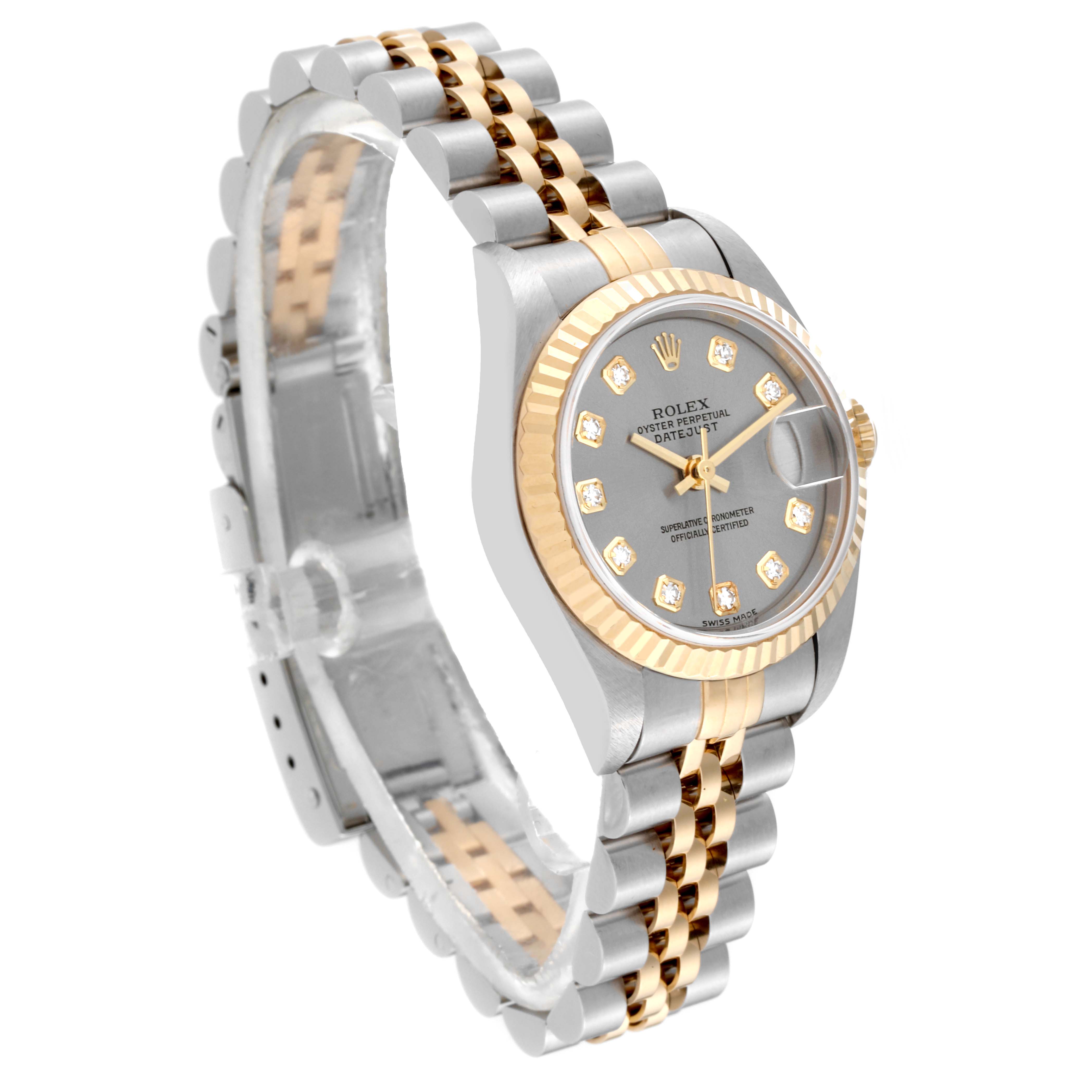 The image shows a Rolex Datejust 79173 Women's Steel and Gold (two tone) Silver Dial 79173 Women's Steel and Gold (two tone) Silver Dial watch at a slight angle, featuring its two-tone bracelet, fluted bezel, and grey dial with diamond markers.