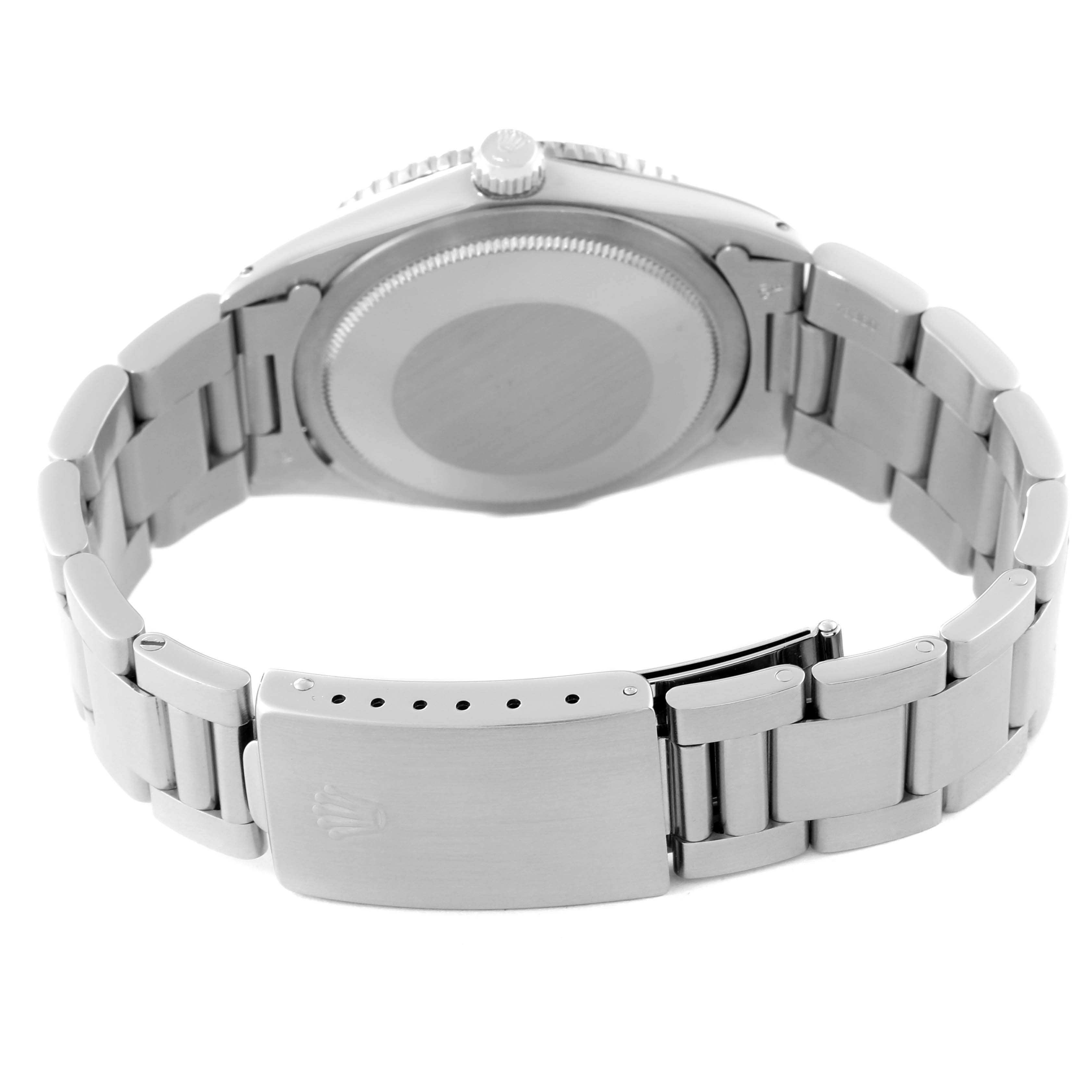 The image shows the underside of a Rolex Vintage Collection 1625/4 Men's Stainless Steel Silver Dial 1625/4 Men's Stainless Steel Silver Dial watch, highlighting its bracelet, clasp, and case back.