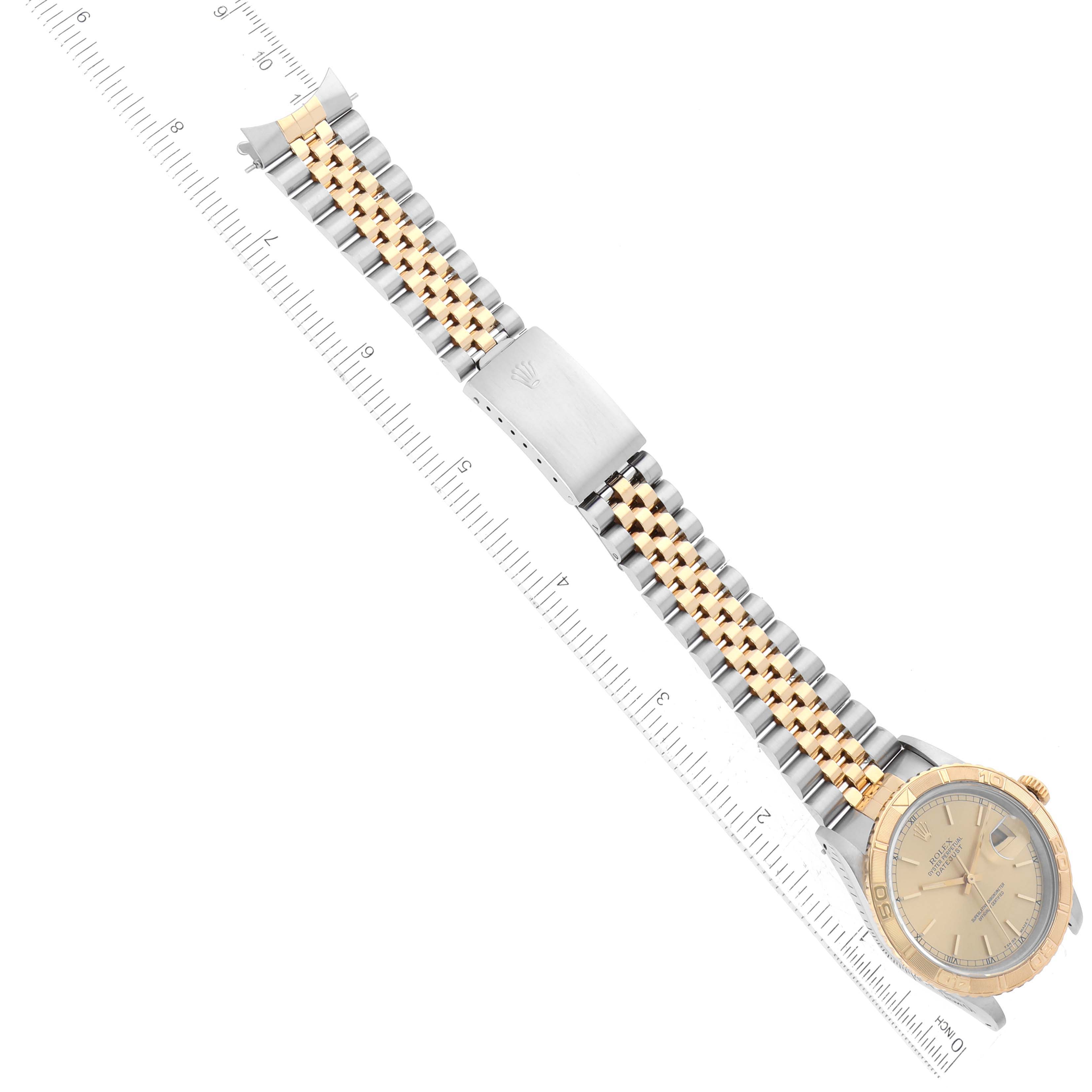 This image shows a top-down view of a Rolex Turn-o-Graph 16263 Men's Steel and Gold (two tone) Champagne Dial 16263 Men's Steel and Gold (two tone) Champagne Dial watch, displaying its dial, bezel, and two-tone bracelet.