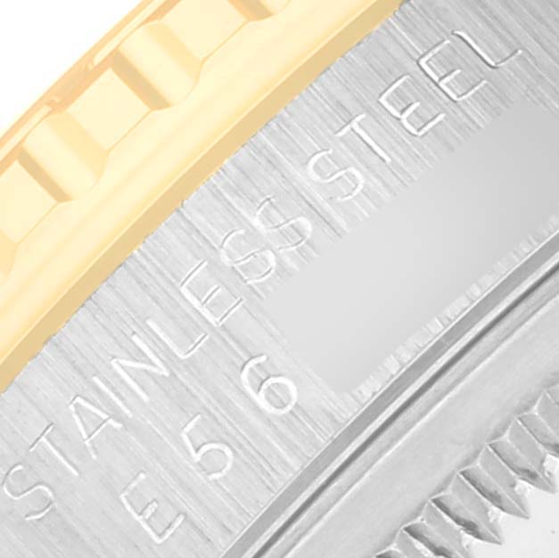 This close-up image shows the stainless steel and gold bezel with engraved text of the Rolex Turn-o-Graph 16263 Men's Steel and Gold (two tone) Champagne Dial 16263 Men's Steel and Gold (two tone) Champagne Dial model watch.