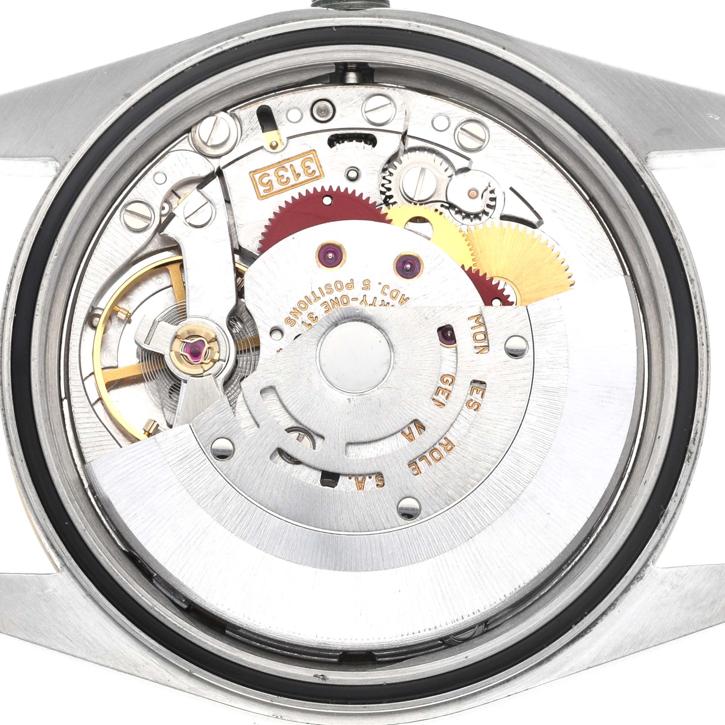 The image shows a close-up of the inner mechanical movement of a Rolex Datejust 16233 Men's Steel and Gold (two tone) White Dial 16233 Men's Steel and Gold (two tone) White Dial watch, focusing on the gears and rotor.