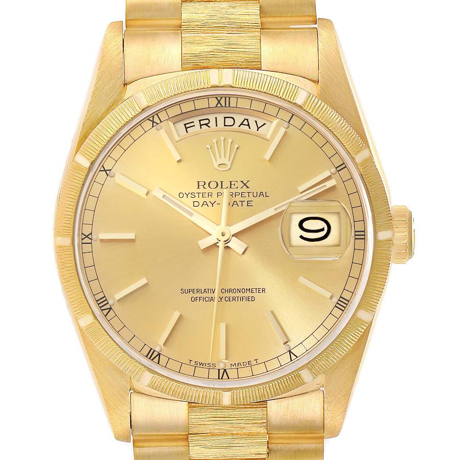 The image shows the Rolex President model watch from a front angle, highlighting the dial, day, date, and part of the bracelet.