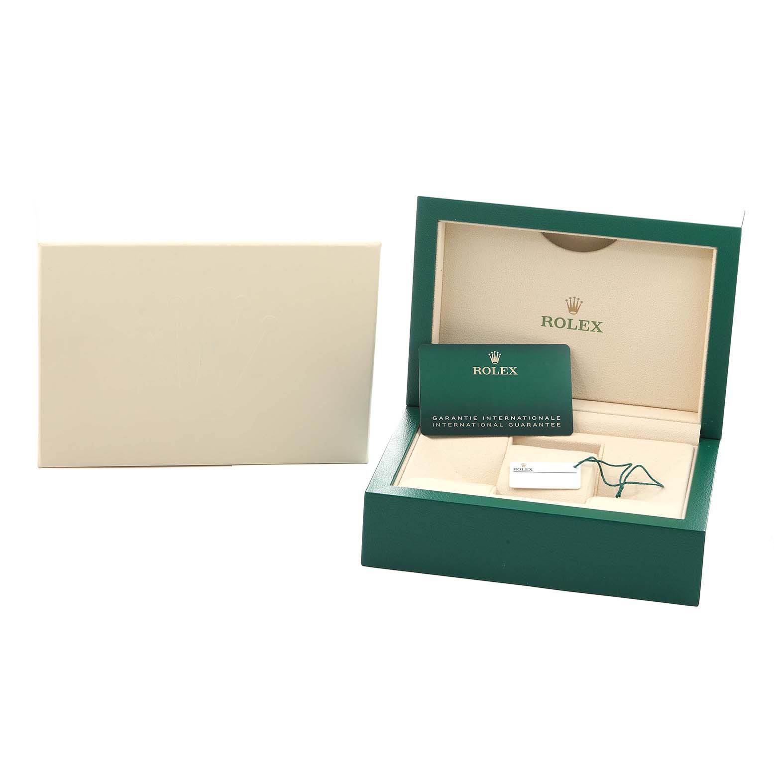 The image shows the open green box and warranty card for a Rolex Daytona 116500 Men
s Stainless Steel White Dial watch.