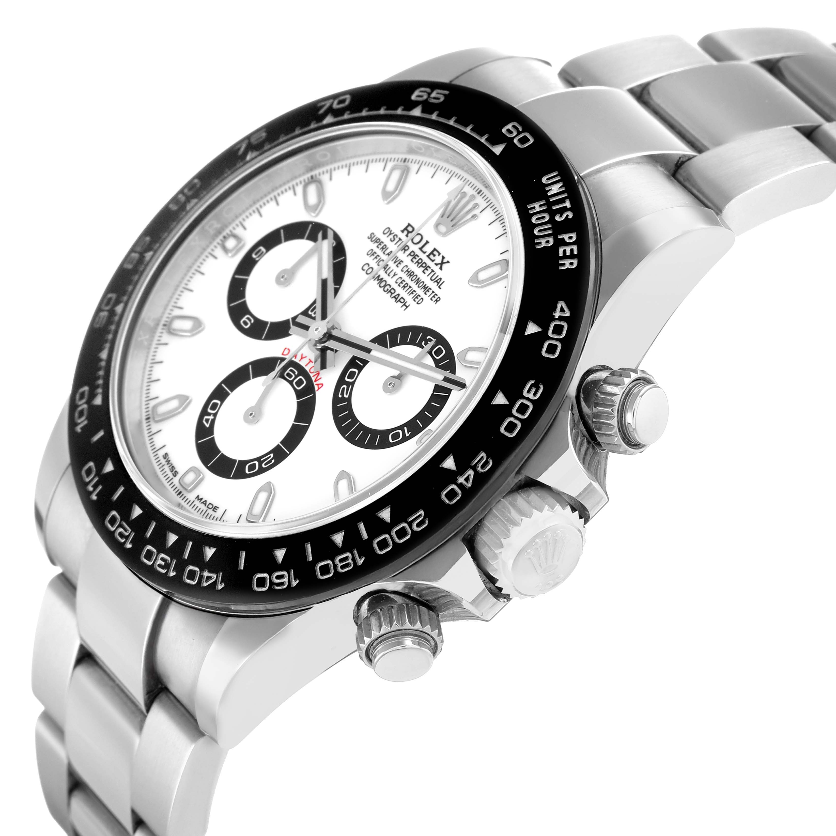 The Rolex Daytona 116500 Men
s Stainless Steel White Dial watch is shown from a diagonal angle, highlighting the bezel, dial, crown, and part of the bracelet.