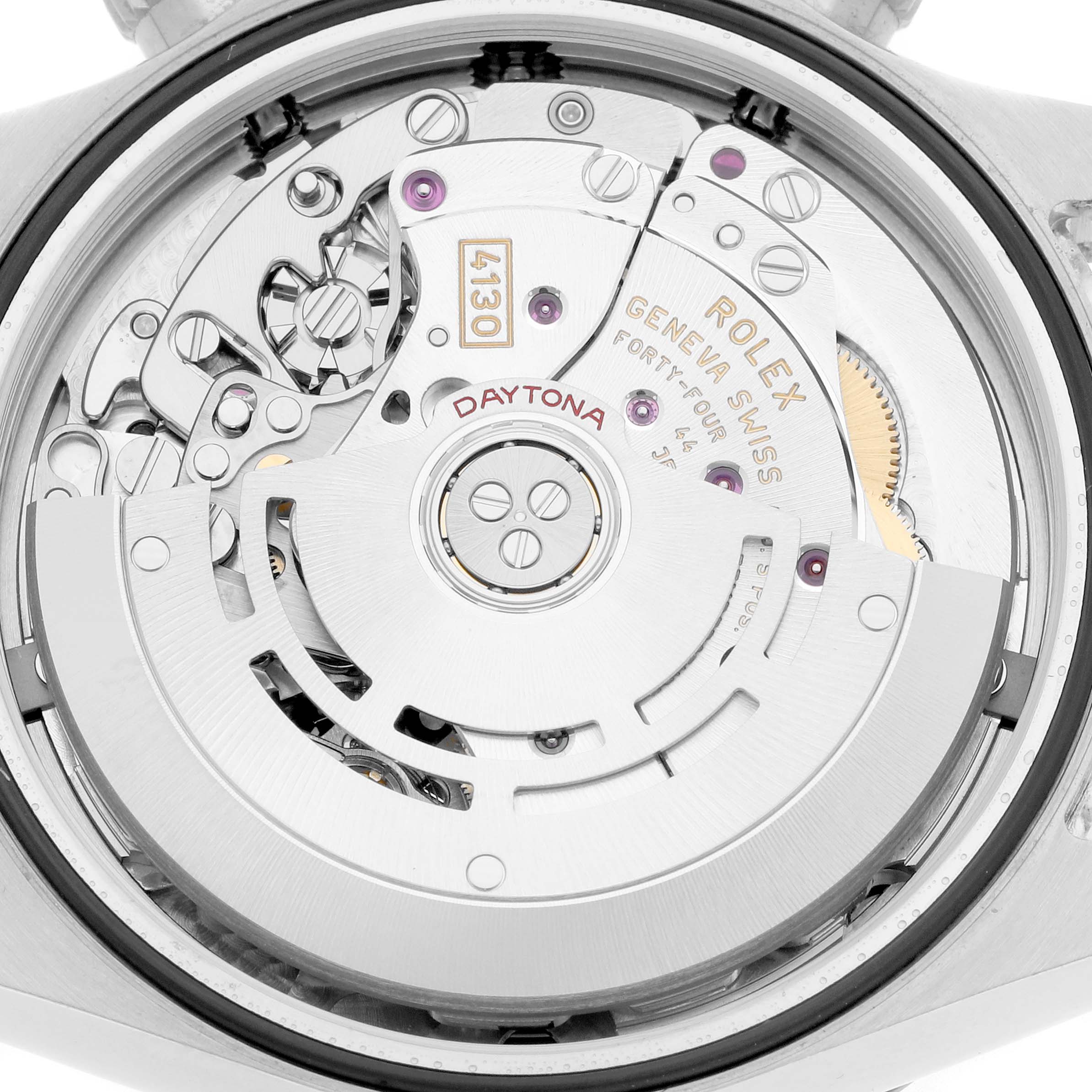 The image shows a close-up of the Rolex Daytona 116500 Men
s Stainless Steel White Dial movement, focusing on its intricate internal mechanisms.