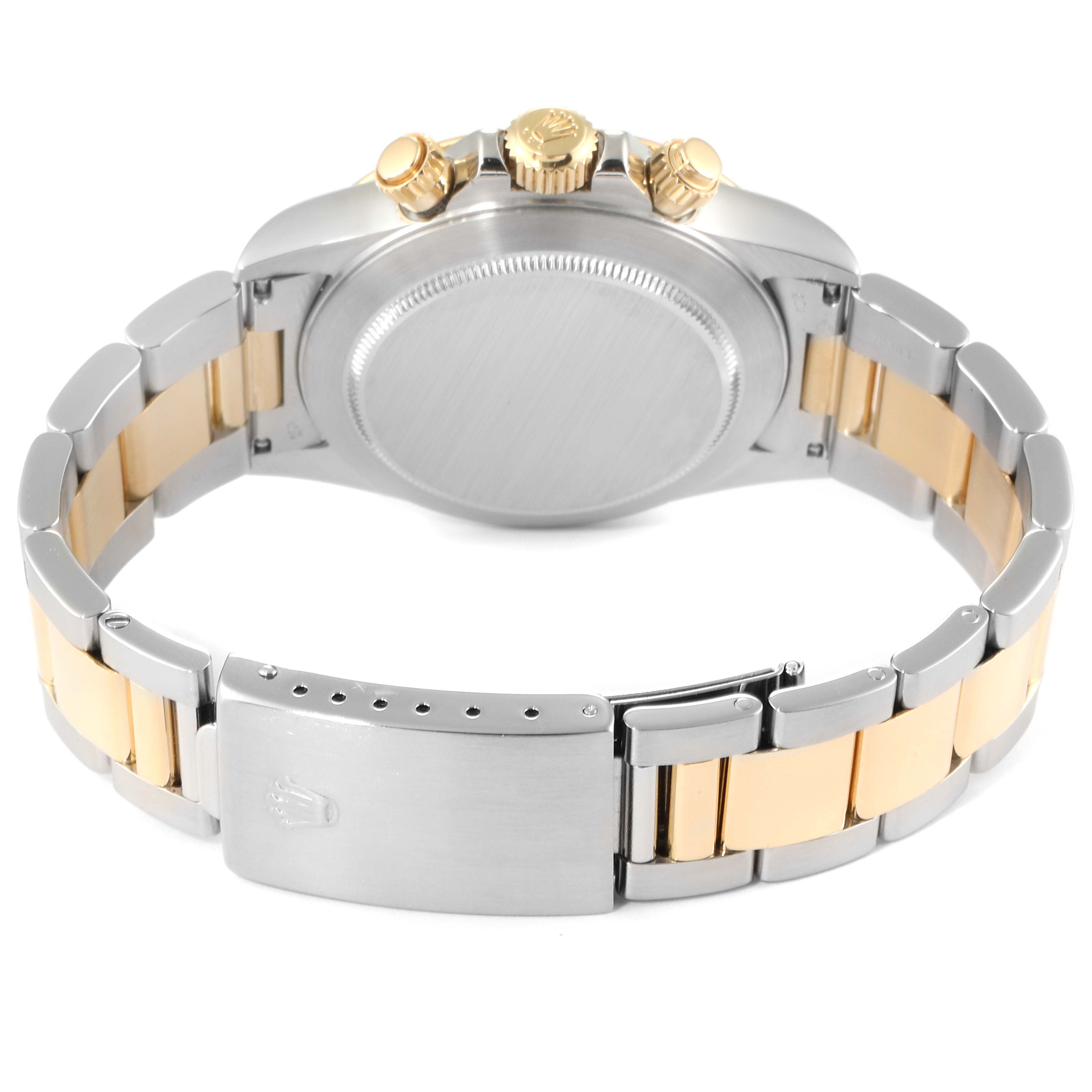 The image shows the back of a Rolex Daytona 16523 Men's Steel and Gold (two tone) Champagne Dial 16523 Men's Steel and Gold (two tone) Champagne Dial watch, highlighting the case back, bracelet, clasp, and push buttons.