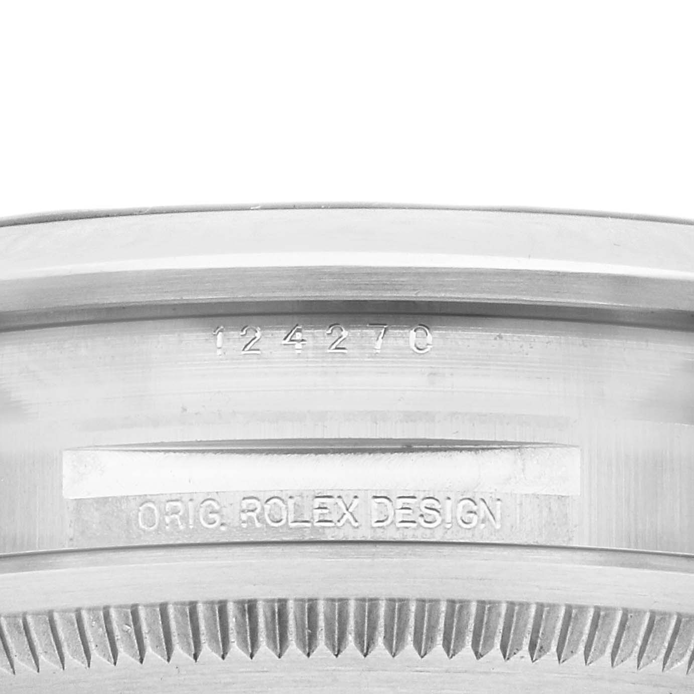 This image shows the side view of a Rolex Explorer 124270 Men
s Stainless Steel Black Dial case, highlighting the model number and "Orig. Rolex Design" engraving.