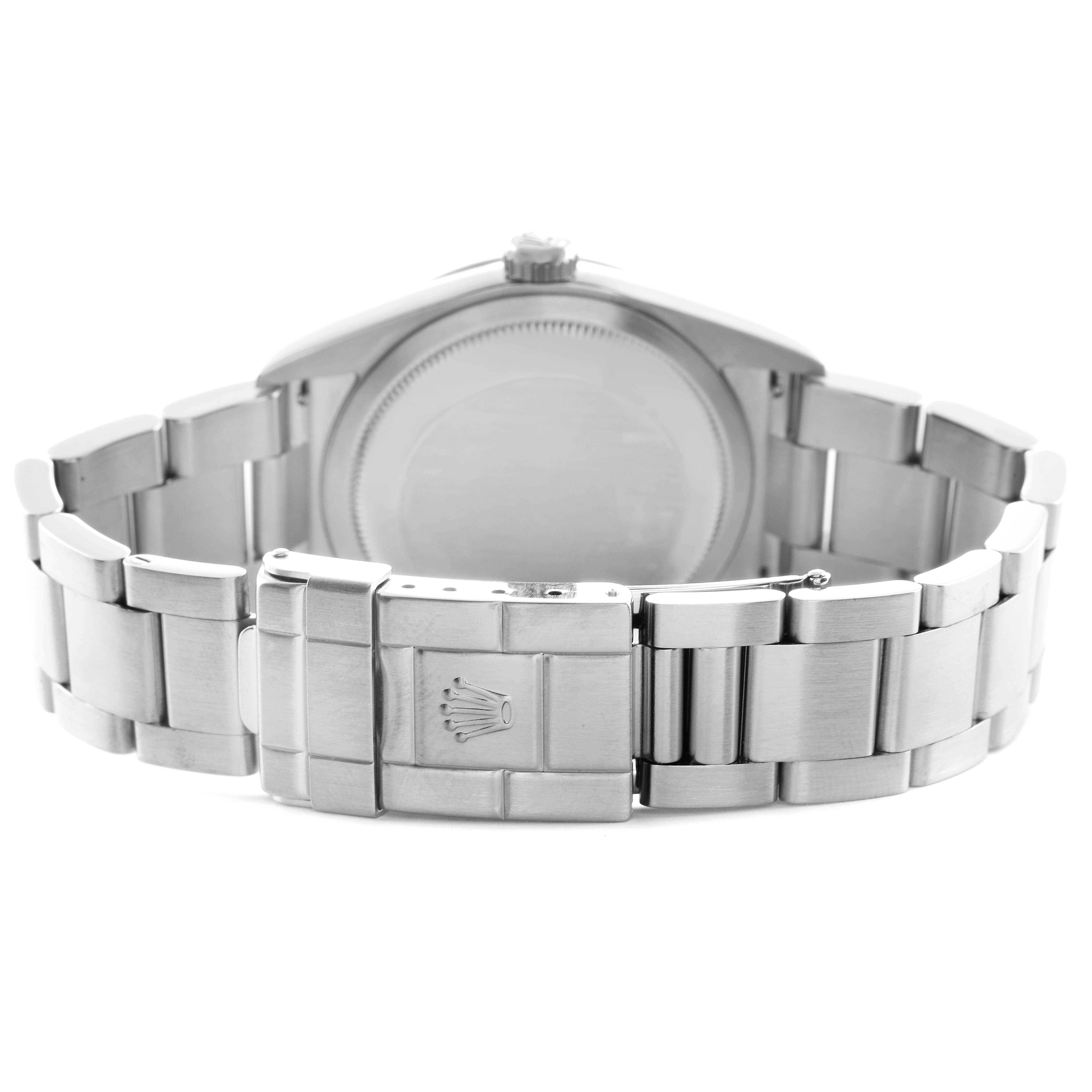 This image shows the back view of a Rolex Explorer 114270 Men's Stainless Steel Black Dial 114270 Men's Stainless Steel Black Dial watch, featuring the clasp, band, and case back.