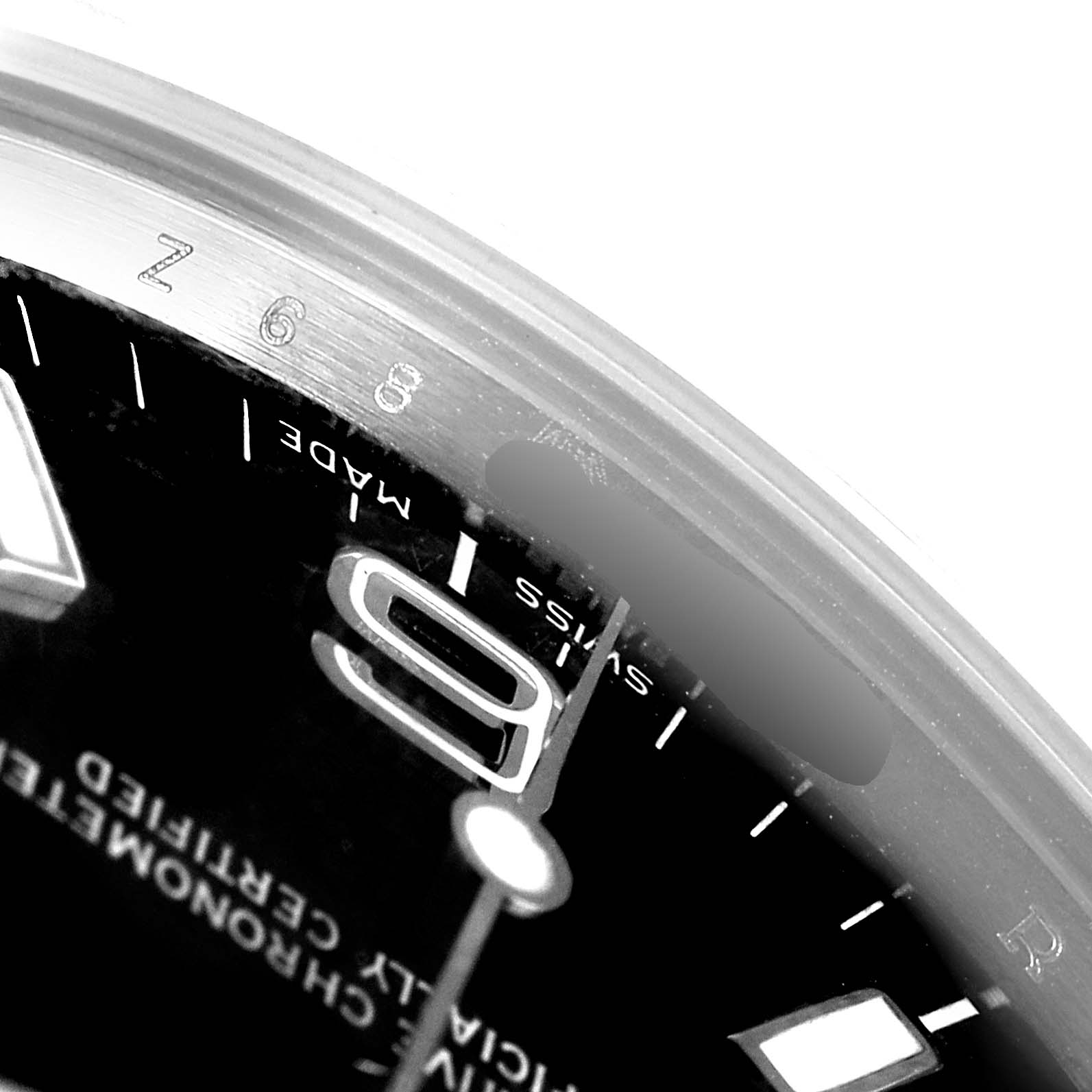 The image shows a close-up angle of the Rolex Explorer 114270 Men's Stainless Steel Black Dial 114270 Men's Stainless Steel Black Dial watch dial, highlighting the numeral "9", "Swiss Made" text, and part of the bezel.