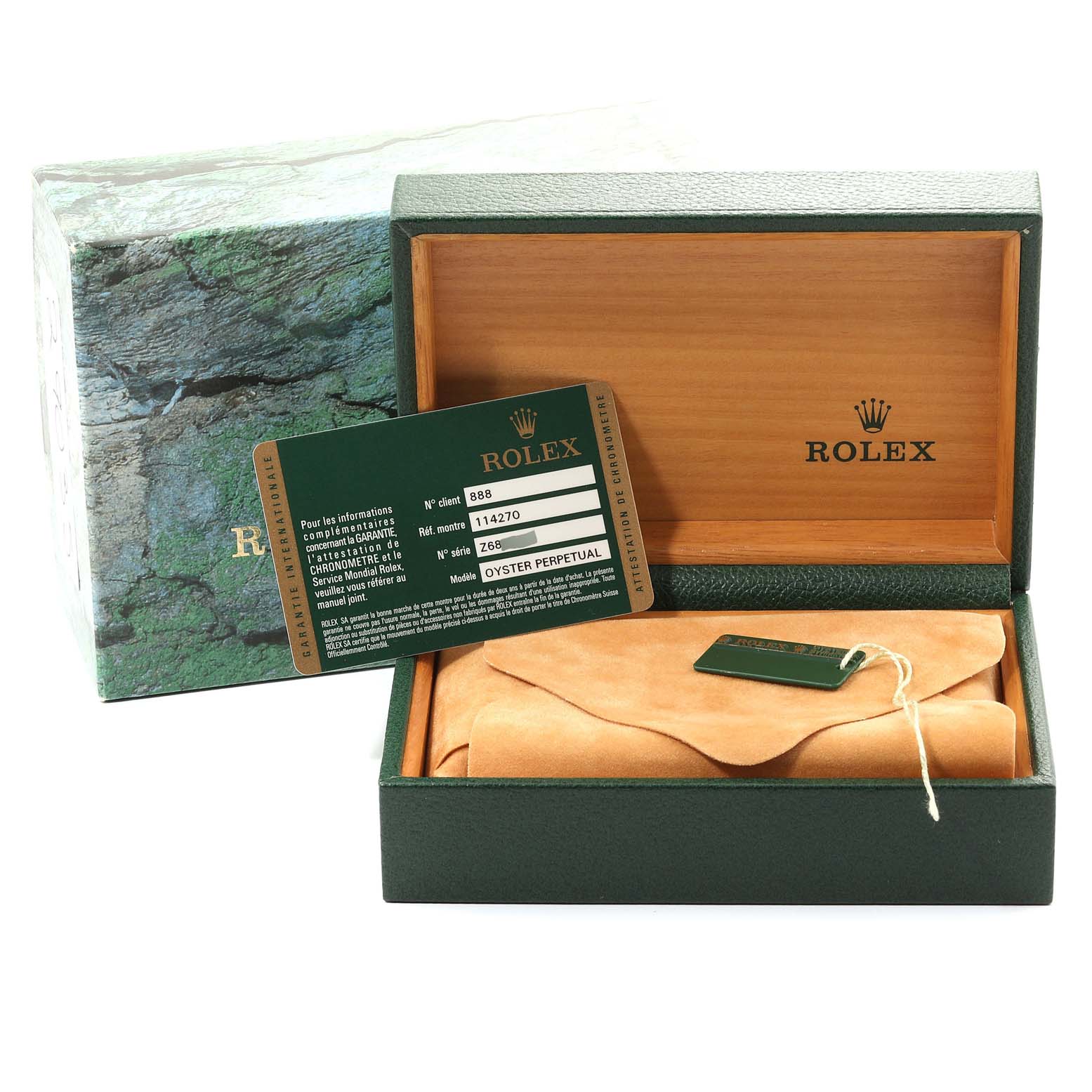 The image shows a Rolex Explorer 114270 Men's Stainless Steel Black Dial 114270 Men's Stainless Steel Black Dial watch box with authenticity card, green tag, and leather pouch, photographed front-on.