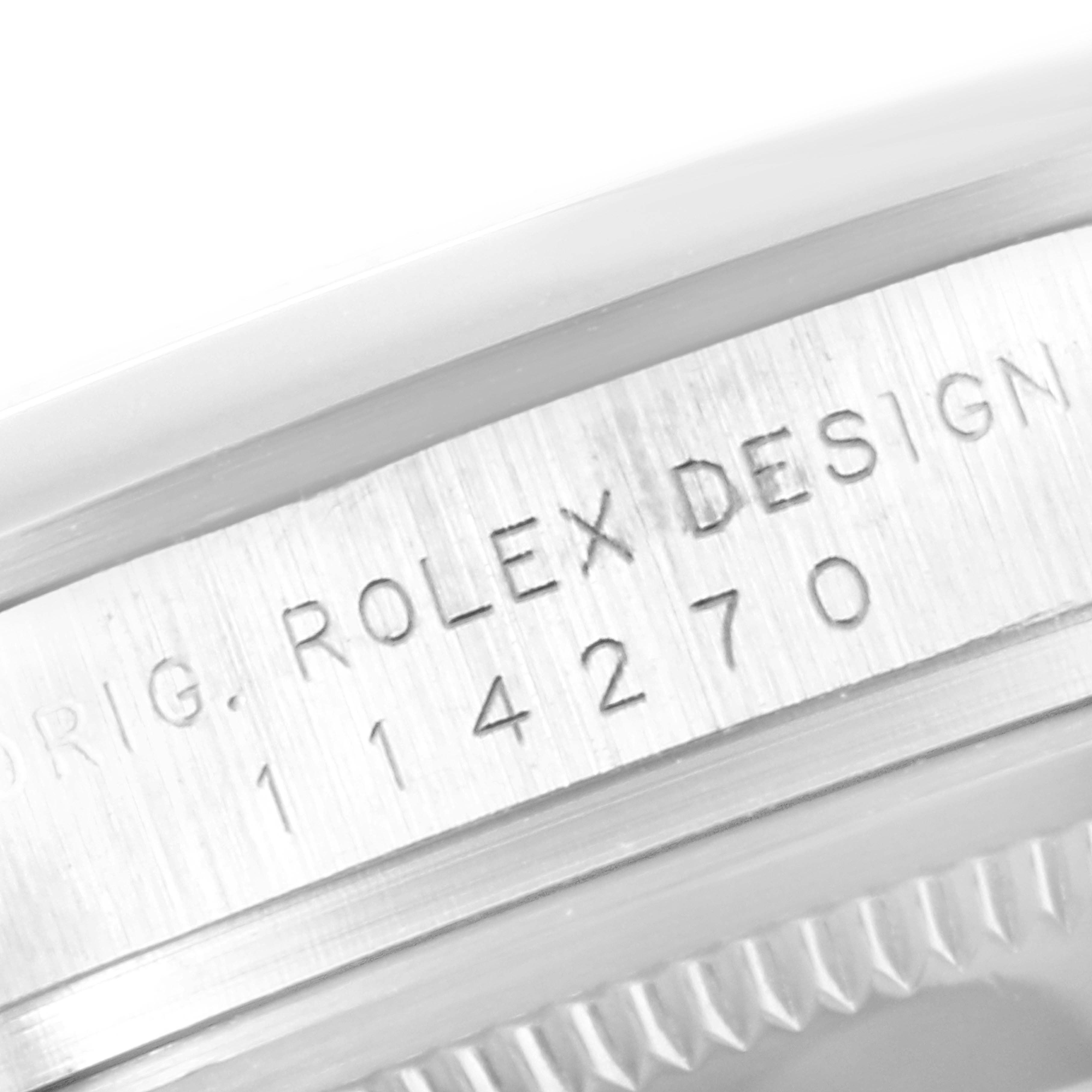 This image shows a close-up of the inner bezel with the engraved model number of the Rolex Explorer 114270 Men's Stainless Steel Black Dial 114270 Men's Stainless Steel Black Dial watch.