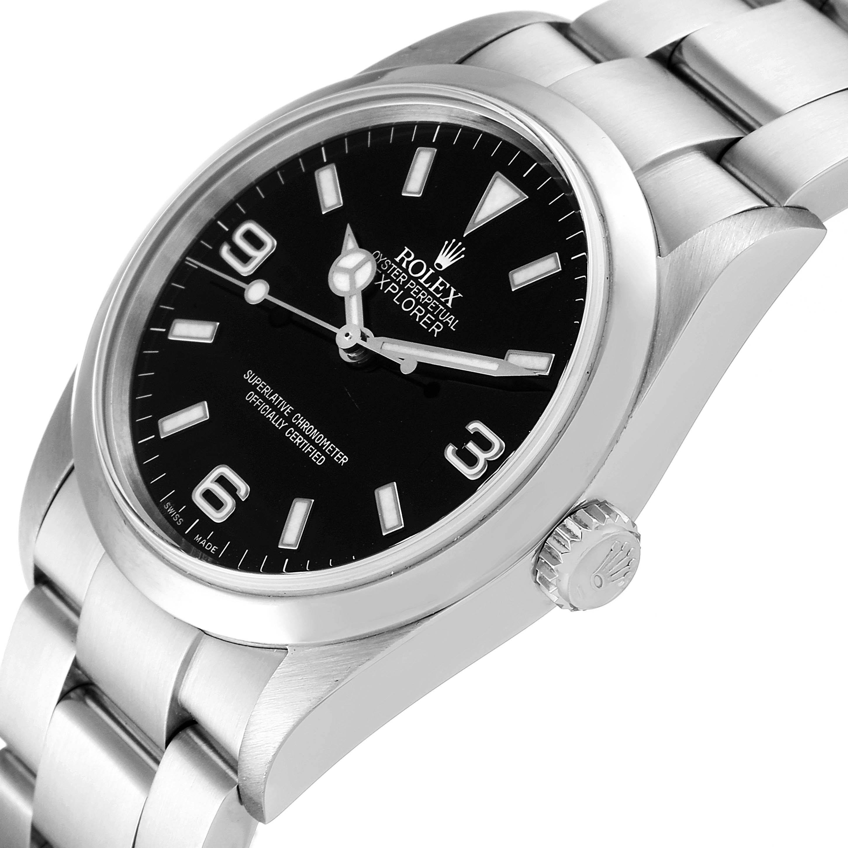 The Rolex Explorer 114270 Men's Stainless Steel Black Dial 114270 Men's Stainless Steel Black Dial watch is shown from a close-up angle highlighting its dial, case, crown, and part of the bracelet.