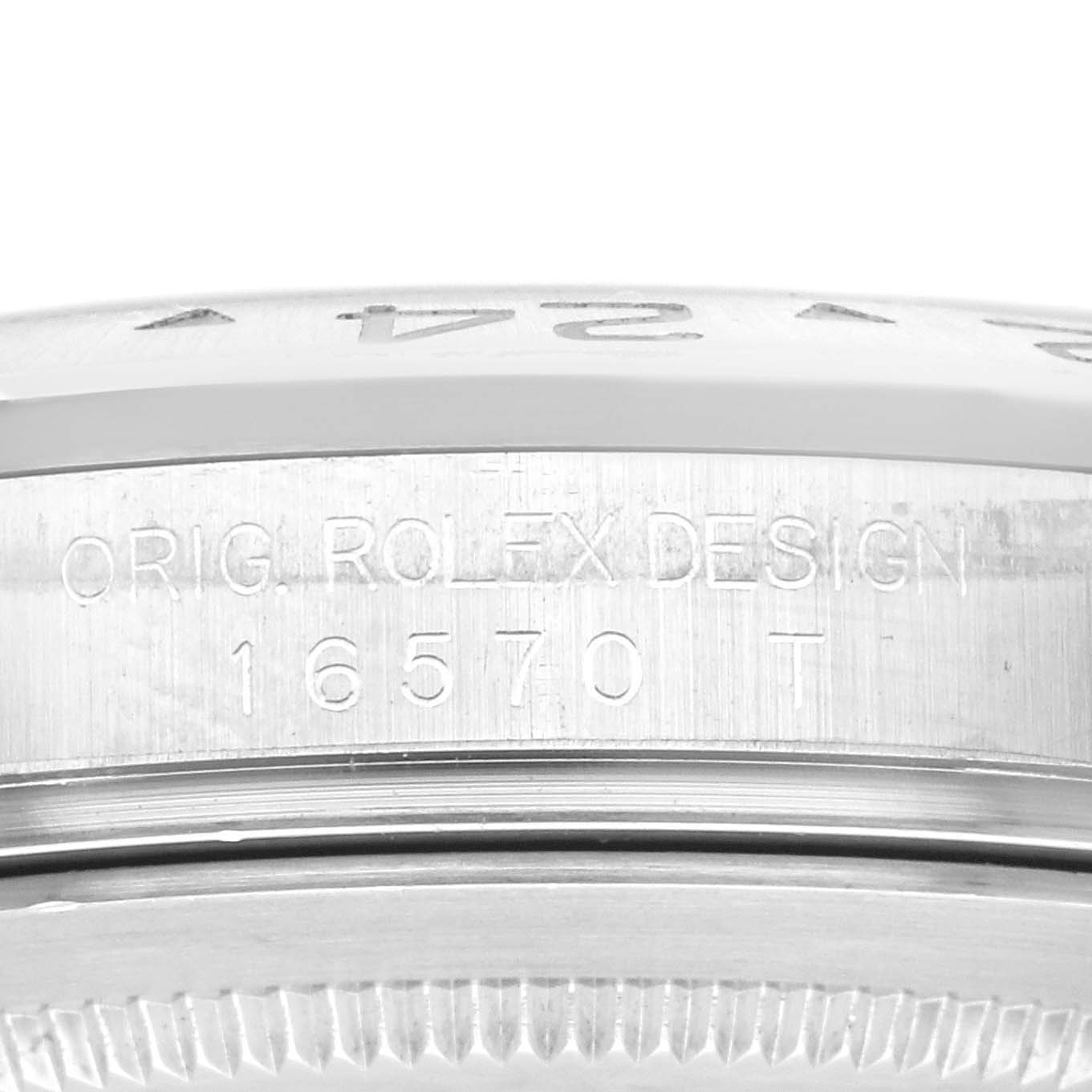 This close-up image shows the engraved reference number and "ORIG ROLEX DESIGN" on the side of the Rolex Explorer 16570 Men
s Stainless Steel Black Dial 16570 Men
s Stainless Steel Black Dial model.