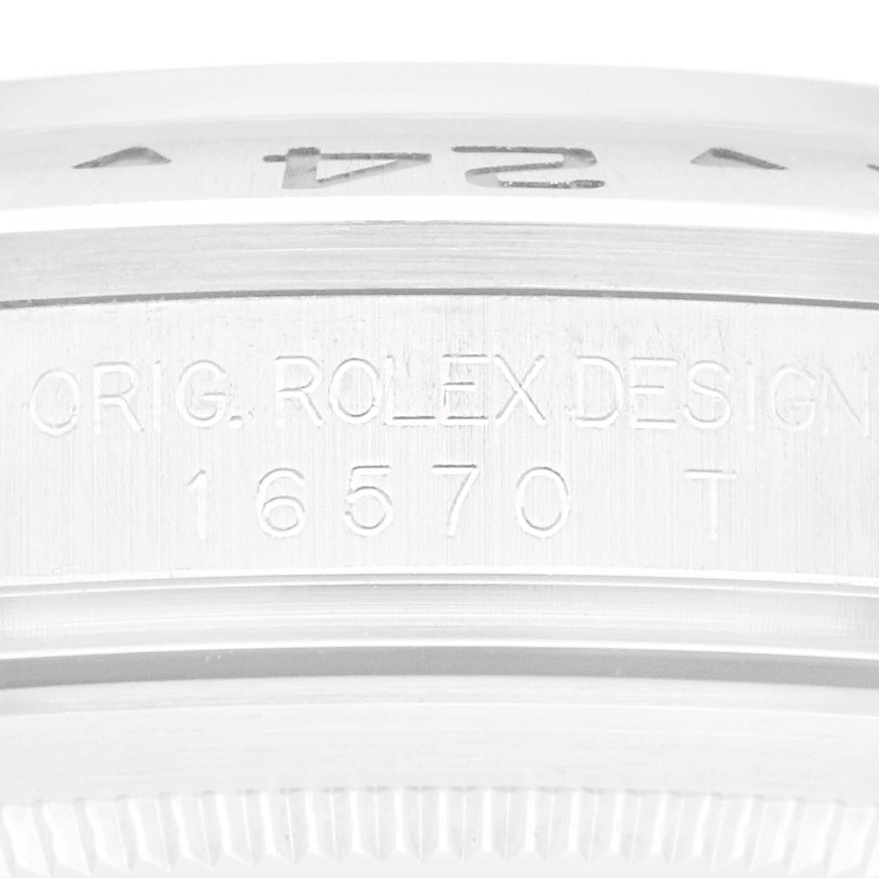The image shows the side view of the case of a Rolex Explorer 16570 Men
s Stainless Steel White Dial, highlighting the engraved design and model number.