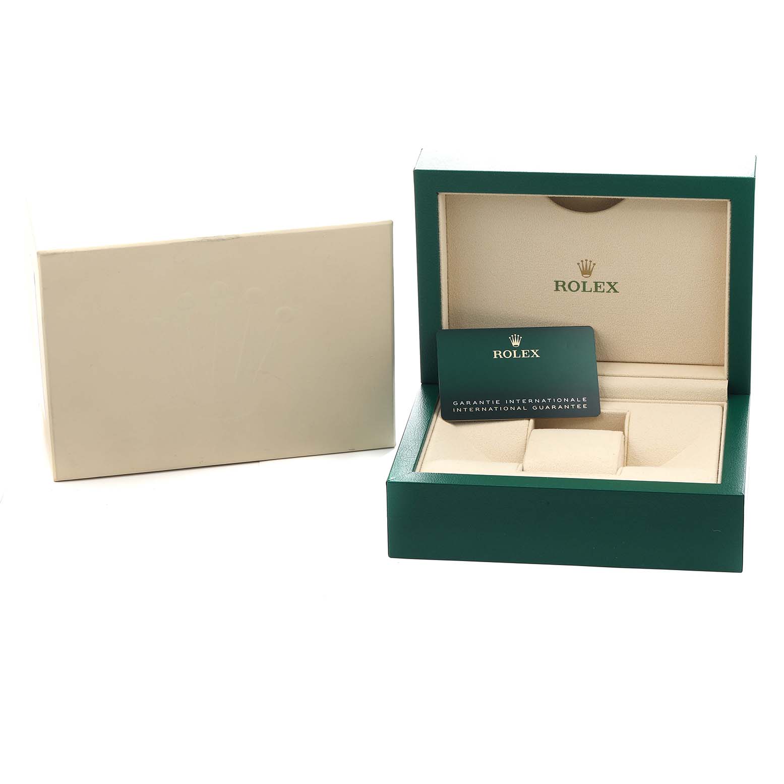 The image shows an open green Rolex box for the GMT-Master model, along with an international guarantee card.