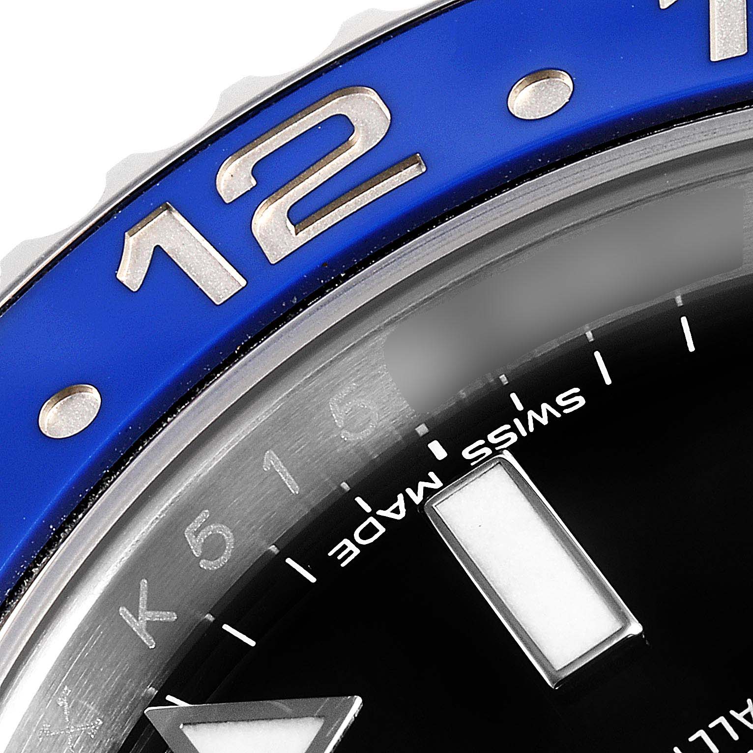 This image shows a close-up of the bezel, dial, and partial markers of a Rolex GMT-Master 116710 Men
s Stainless Steel Black Dial 116710 Men
s Stainless Steel Black Dial watch.