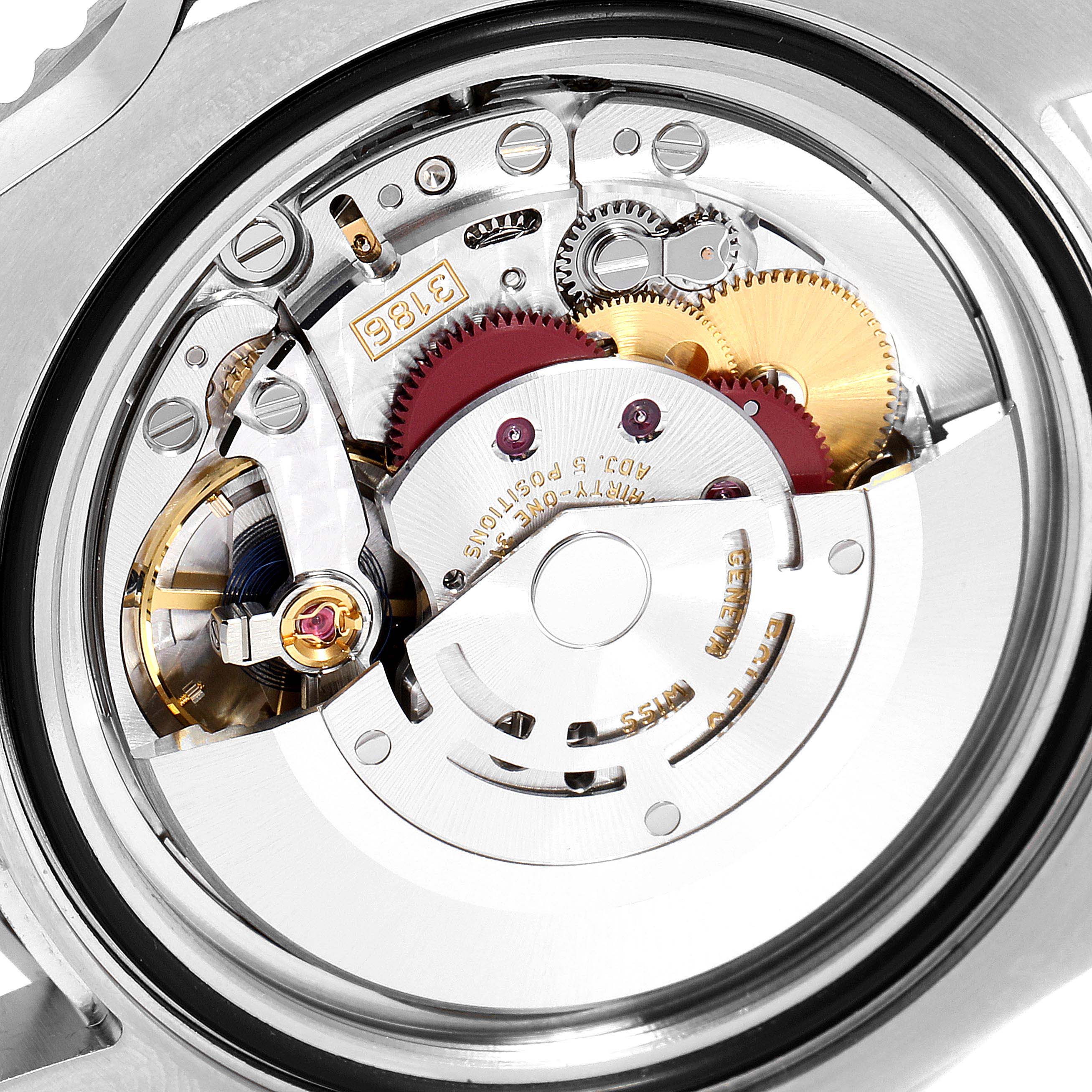 This image shows the Rolex GMT-Master 116710 Men
s Stainless Steel Black Dial 116710 Men
s Stainless Steel Black Dial
s internal movement, highlighting gears and intricate mechanical components from a back angle.