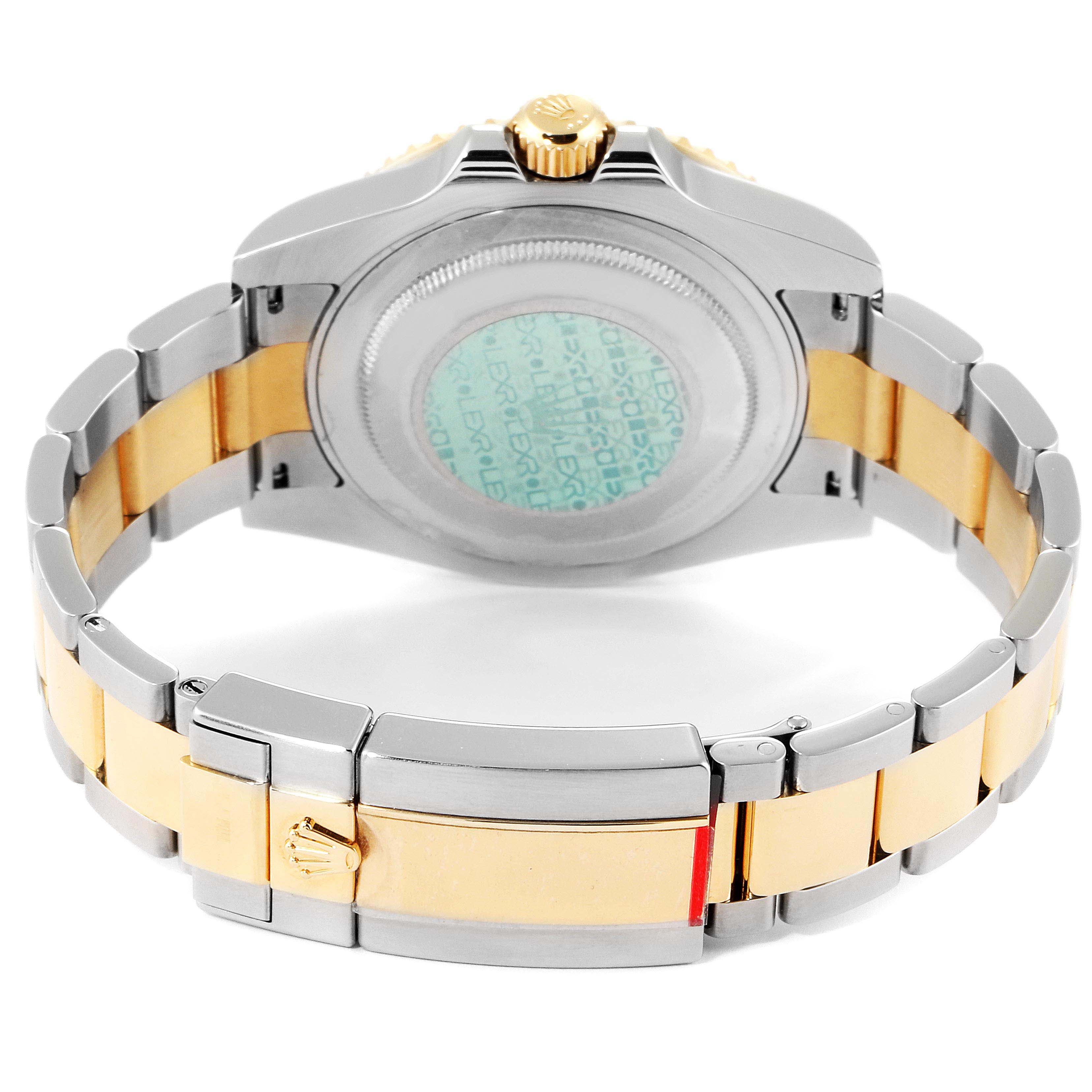 The image shows the back and bracelet of a Rolex GMT-Master 116713 Men's Steel and Gold (two tone) Black Dial 116713 Men's Steel and Gold (two tone) Black Dial watch, highlighting the clasp and caseback.