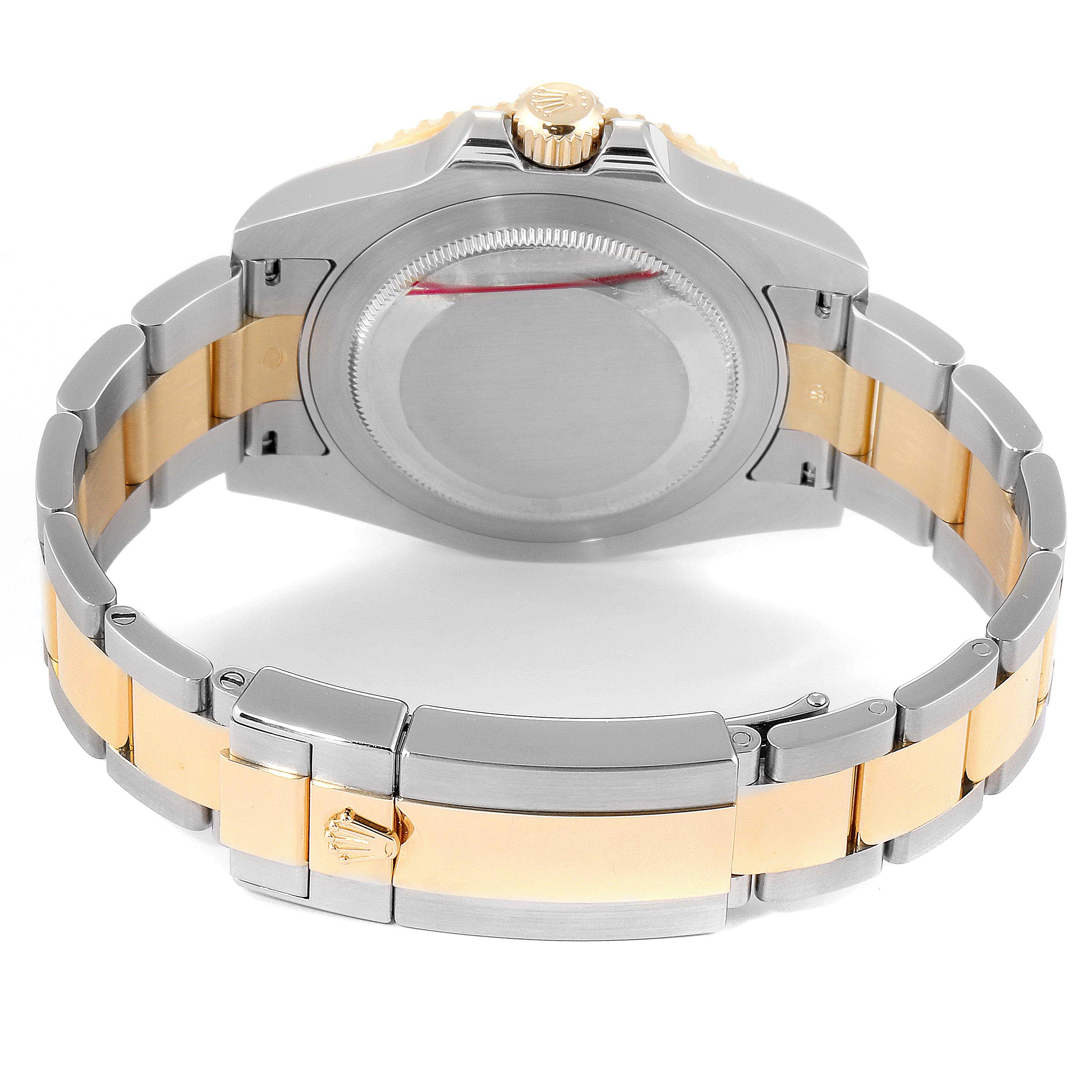 The image shows the back case and bracelet of a Rolex GMT-Master 116713 Men's Steel and Gold (two tone) Black Dial 116713 Men's Steel and Gold (two tone) Black Dial watch, angled from the rear.