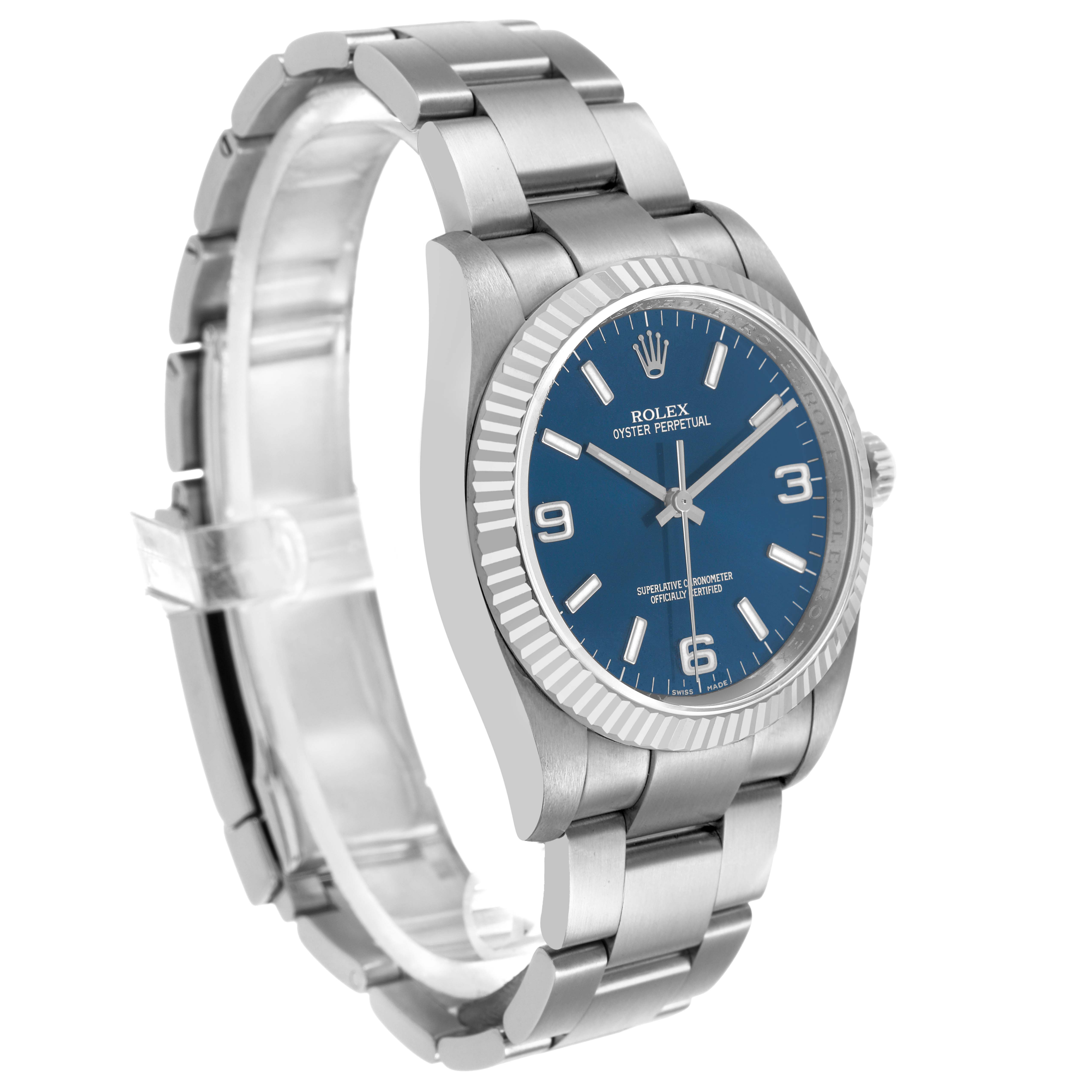 The image shows a Rolex Oyster Perpetual 116034 Men's Stainless Steel Blue Dial watch at a three-quarter angle highlighting its blue dial, bezel, and bracelet.